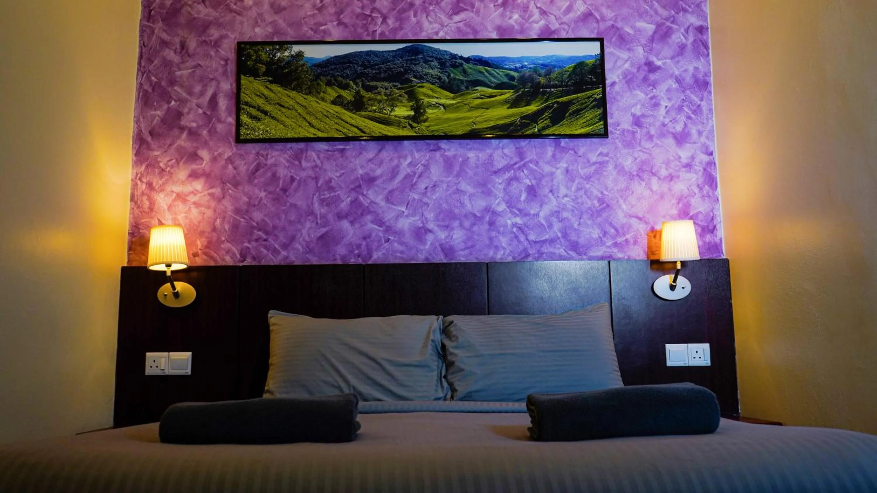 Bed in Highlanders Garden Guesthouse at Arundina Cameron Highlands