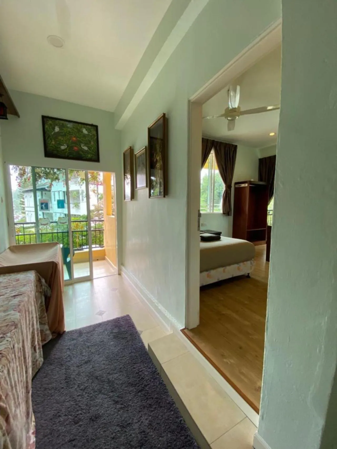 Balcony/Terrace, Bed in Highlanders Garden Guesthouse at Arundina Cameron Highlands