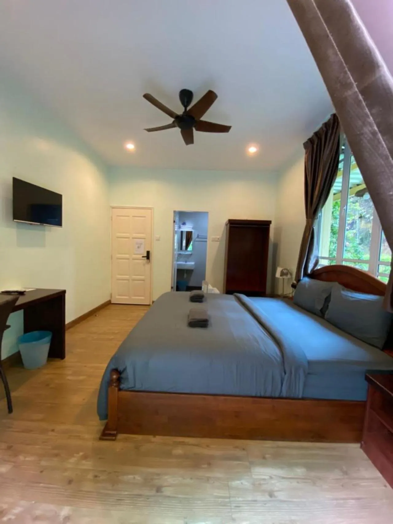 Bed in Highlanders Garden Guesthouse at Arundina Cameron Highlands