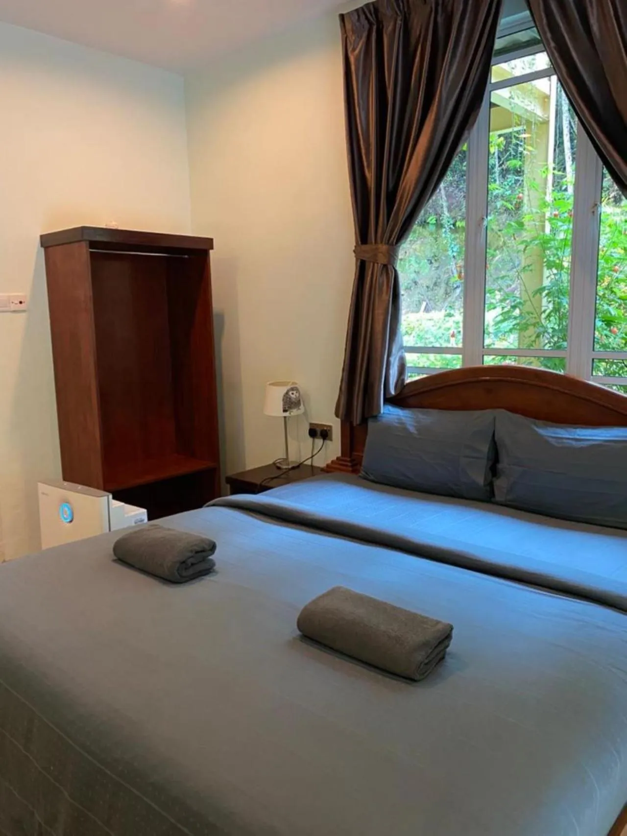 Bed in Highlanders Garden Guesthouse at Arundina Cameron Highlands