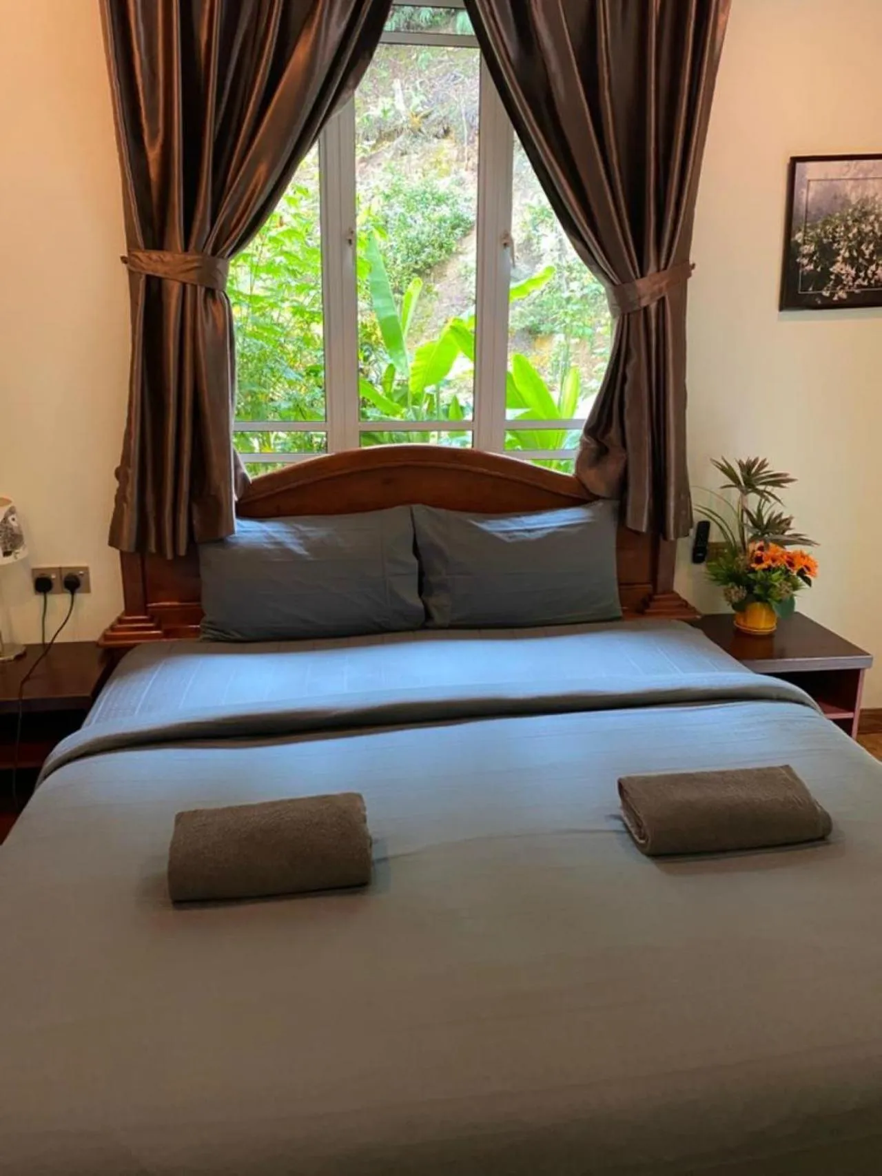 Bed in Highlanders Garden Guesthouse at Arundina Cameron Highlands