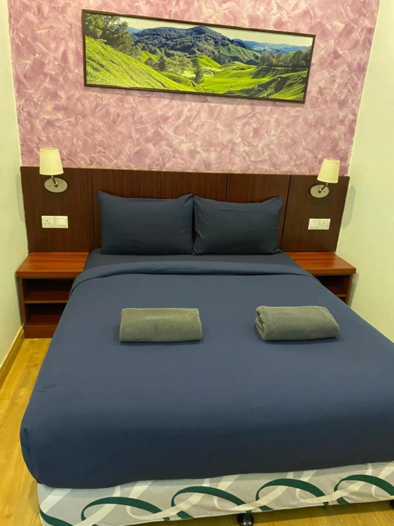 Bed in Highlanders Garden Guesthouse at Arundina Cameron Highlands