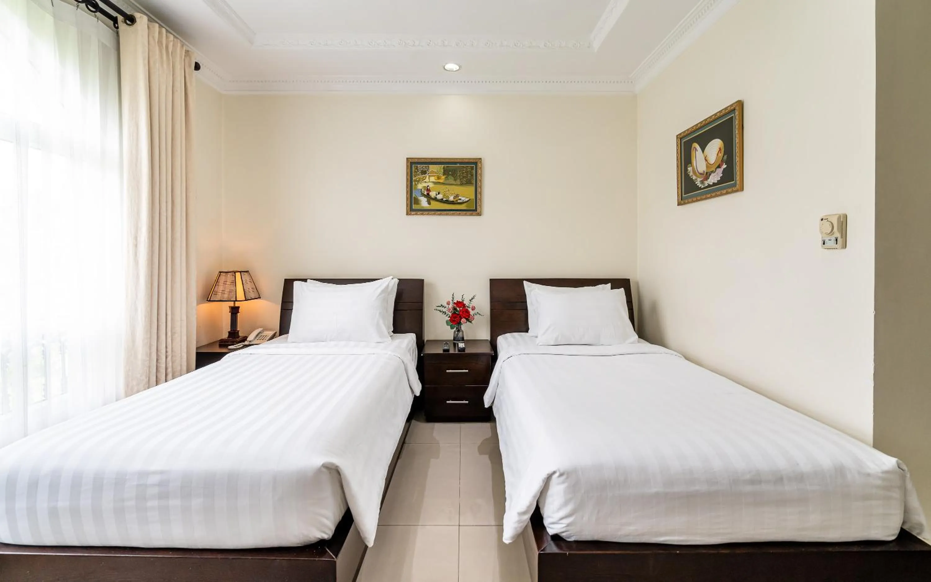 Bed in La Bonita Hotel and Apartments