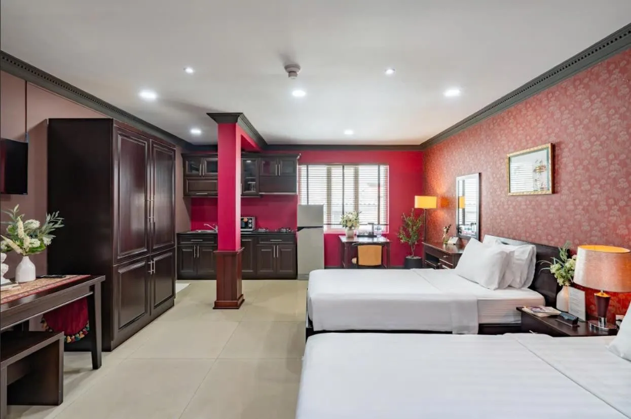 Bed in La Bonita Hotel and Apartments