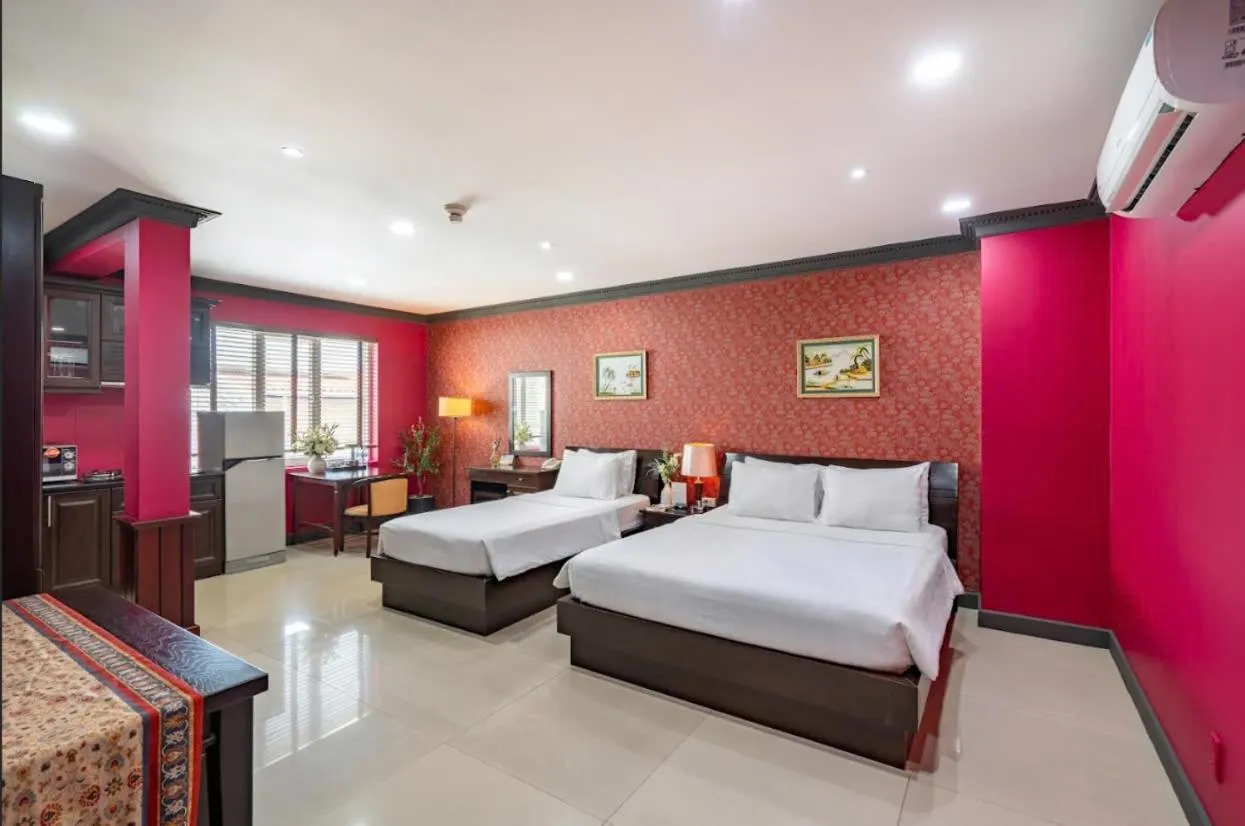 Living room, Bed in La Bonita Hotel and Apartments