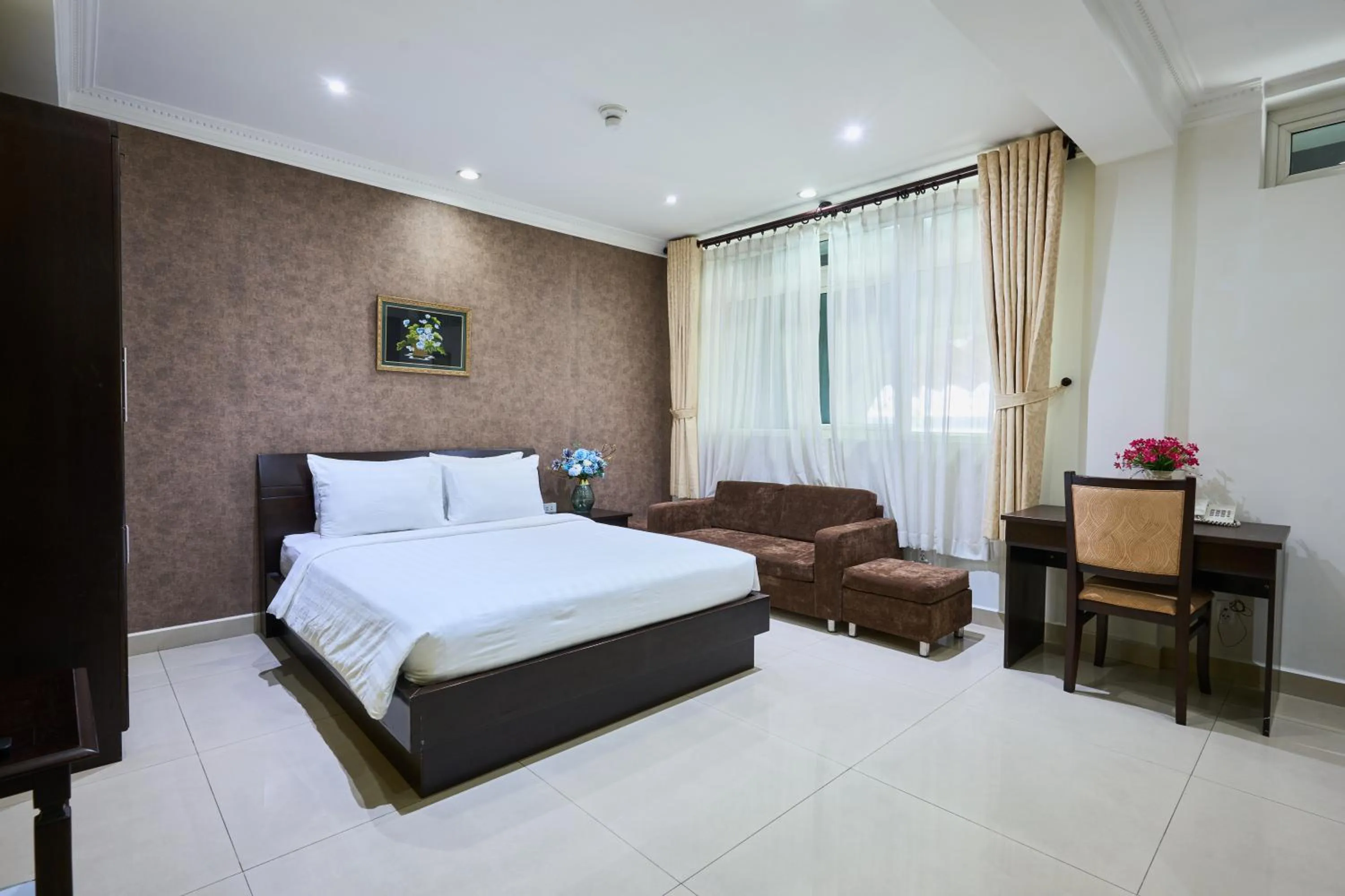 Bedroom, Bed in La Bonita Hotel and Apartments