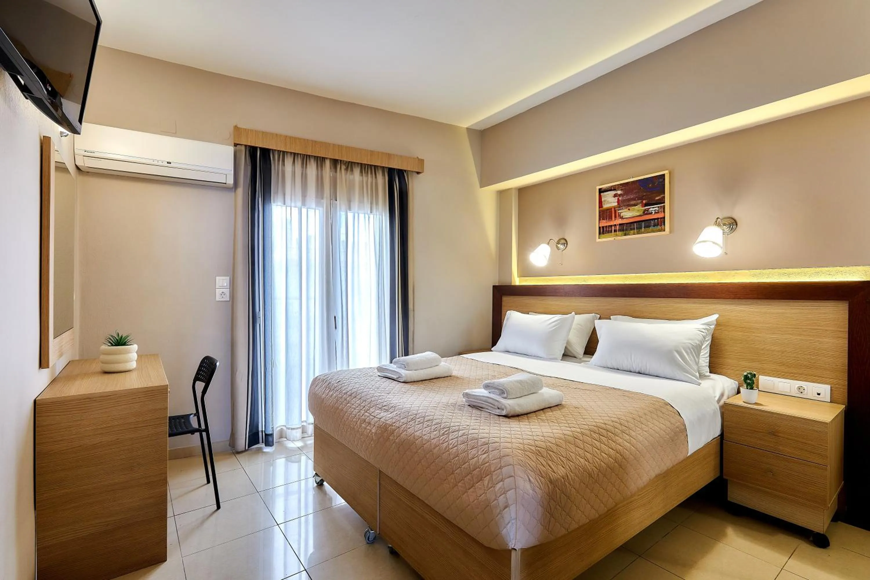 Bed in Dorian Boutique Hotel-Apartments