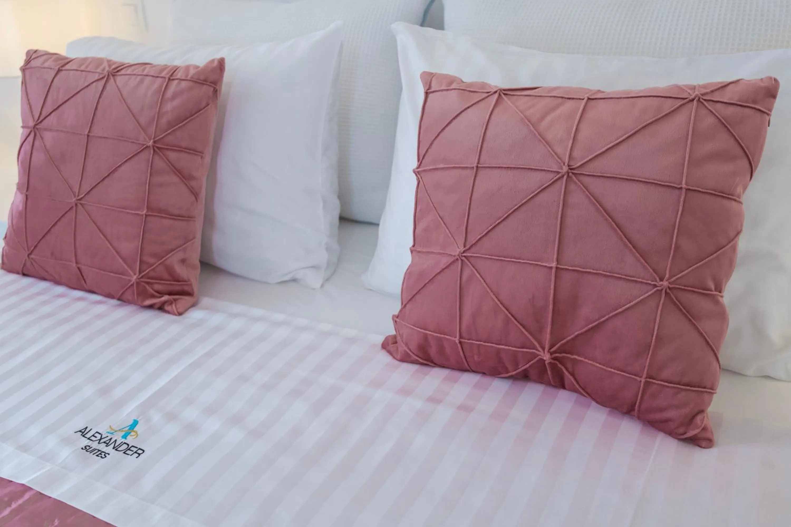 Bed in Alexander Suites