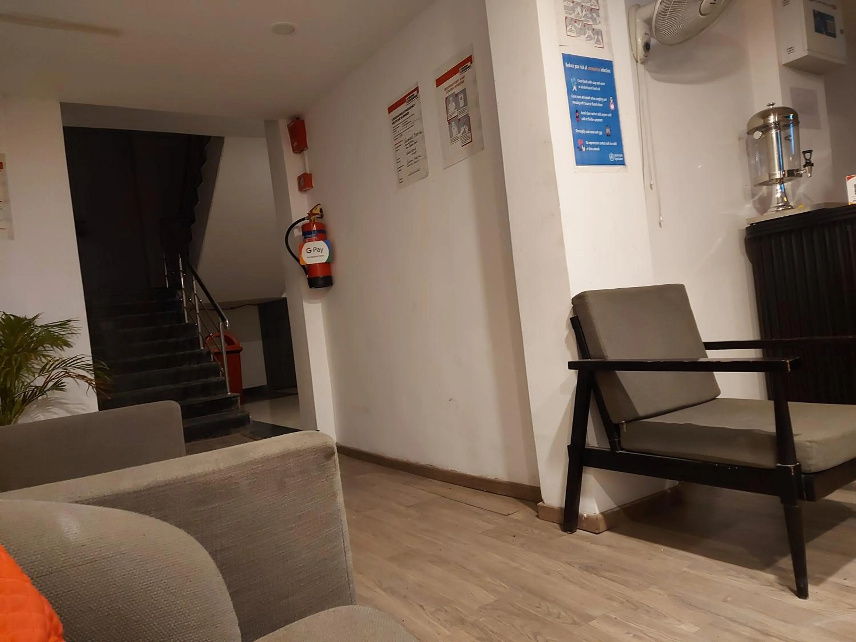 Seating area in Hotel Townhouse at Udaipur City Railway Station