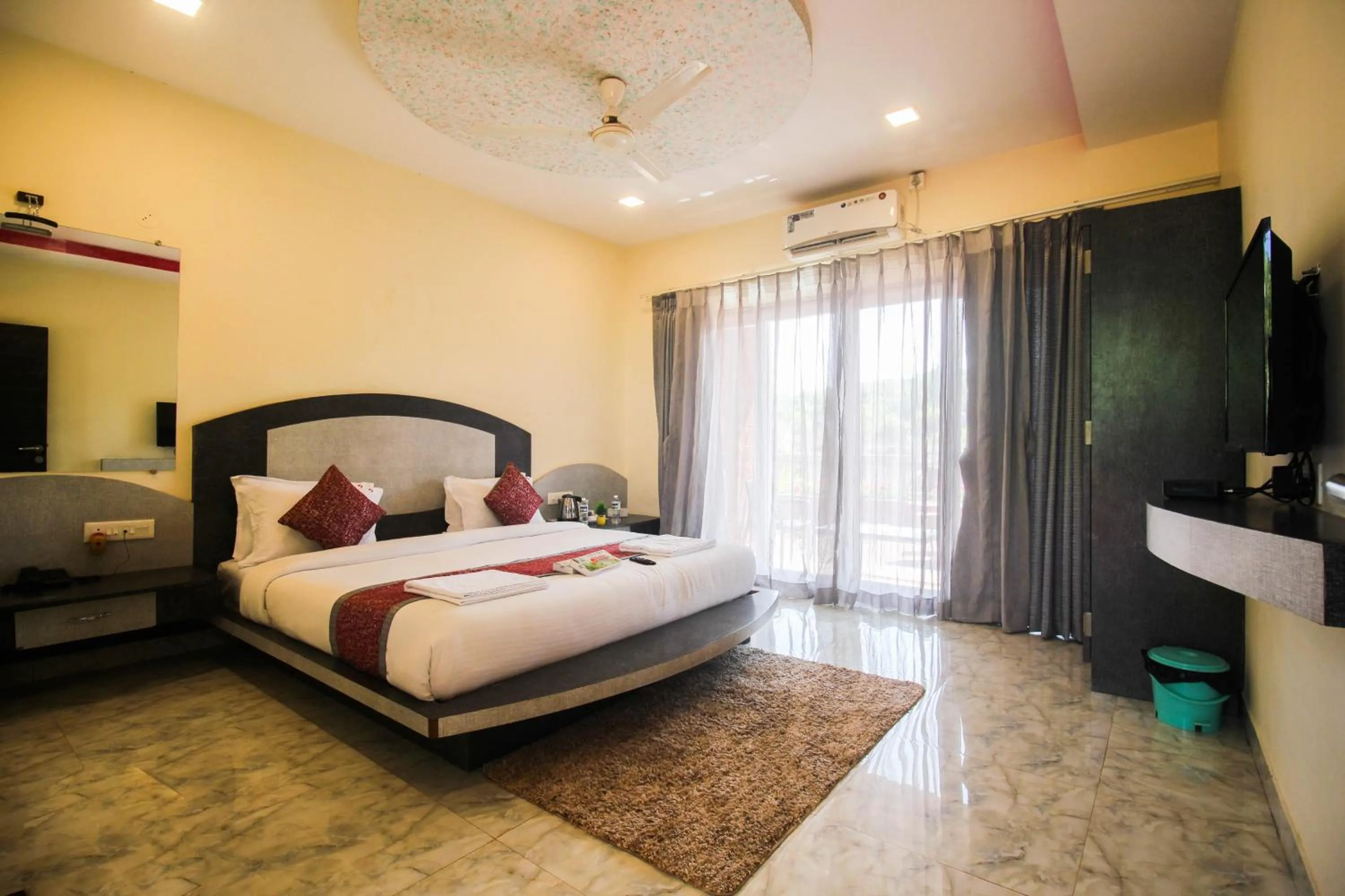 Bed in SHARDUL HERITAGE THE RESORT