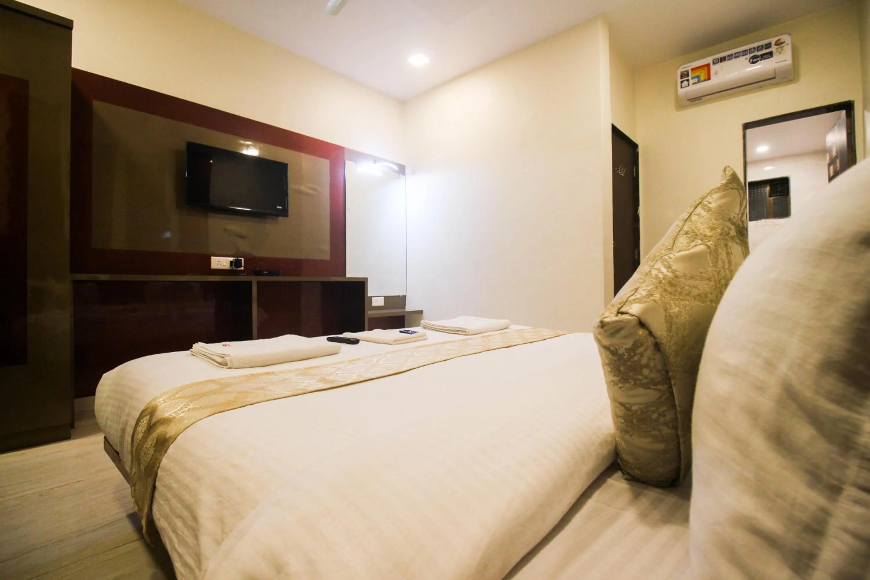 Bed in SHARDUL HERITAGE THE RESORT