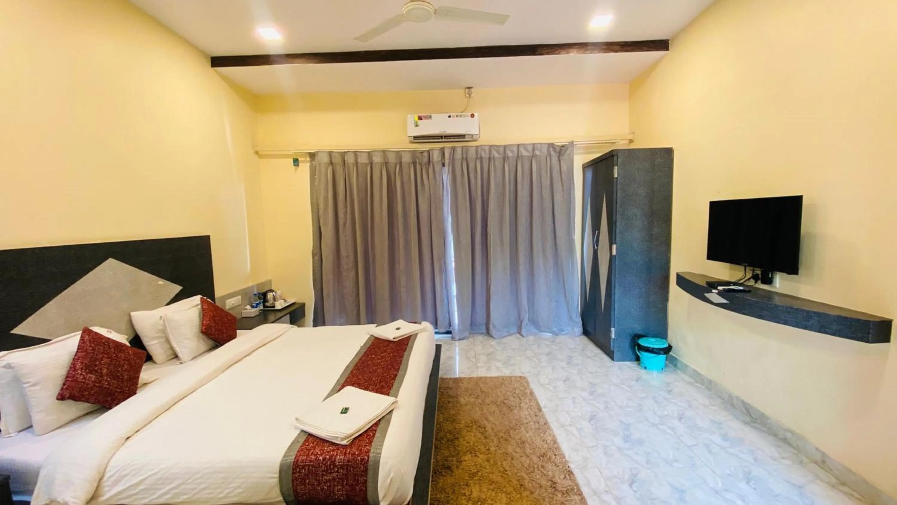 Bed in SHARDUL HERITAGE THE RESORT