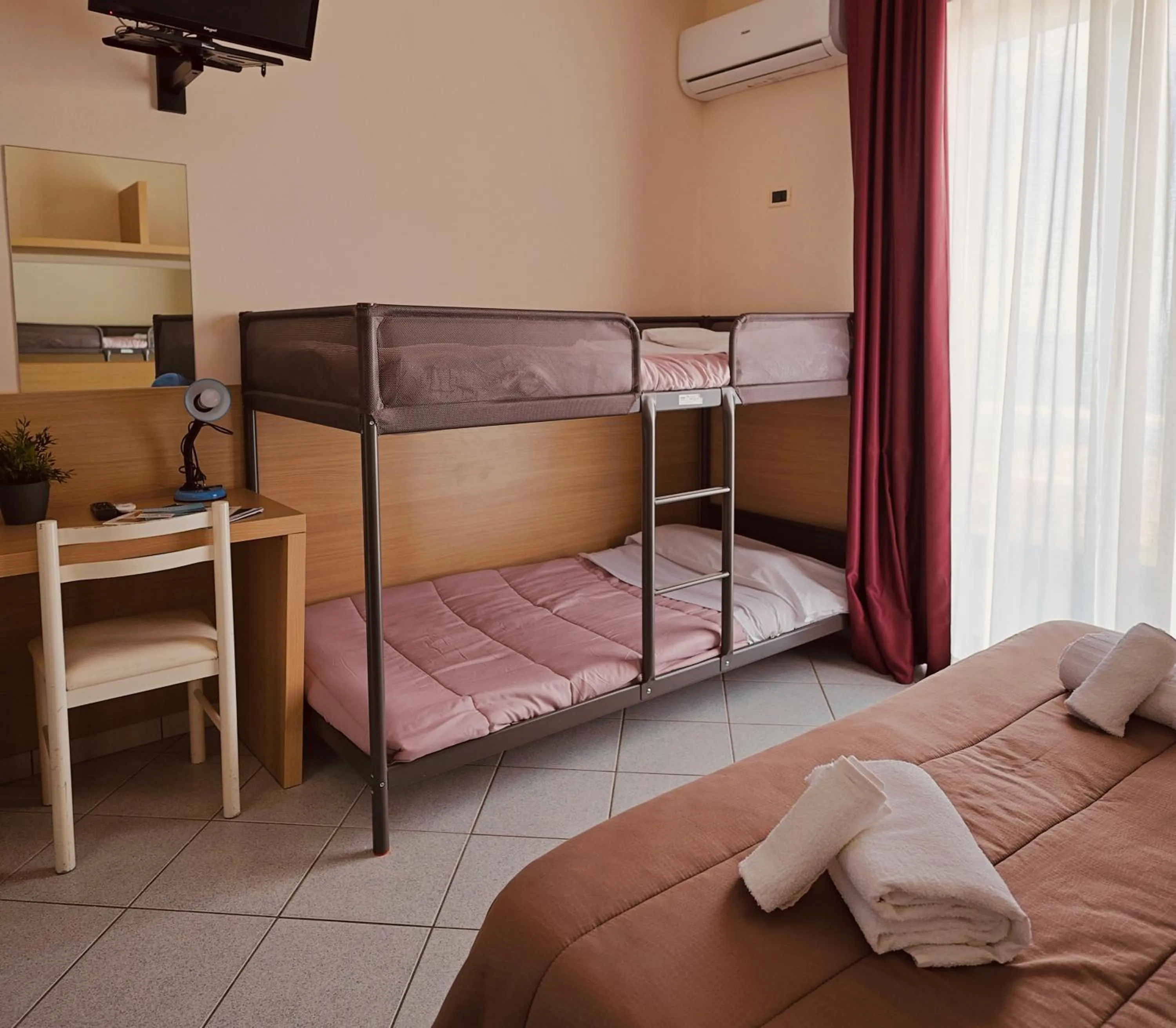 Bed in Hotel Felicioni