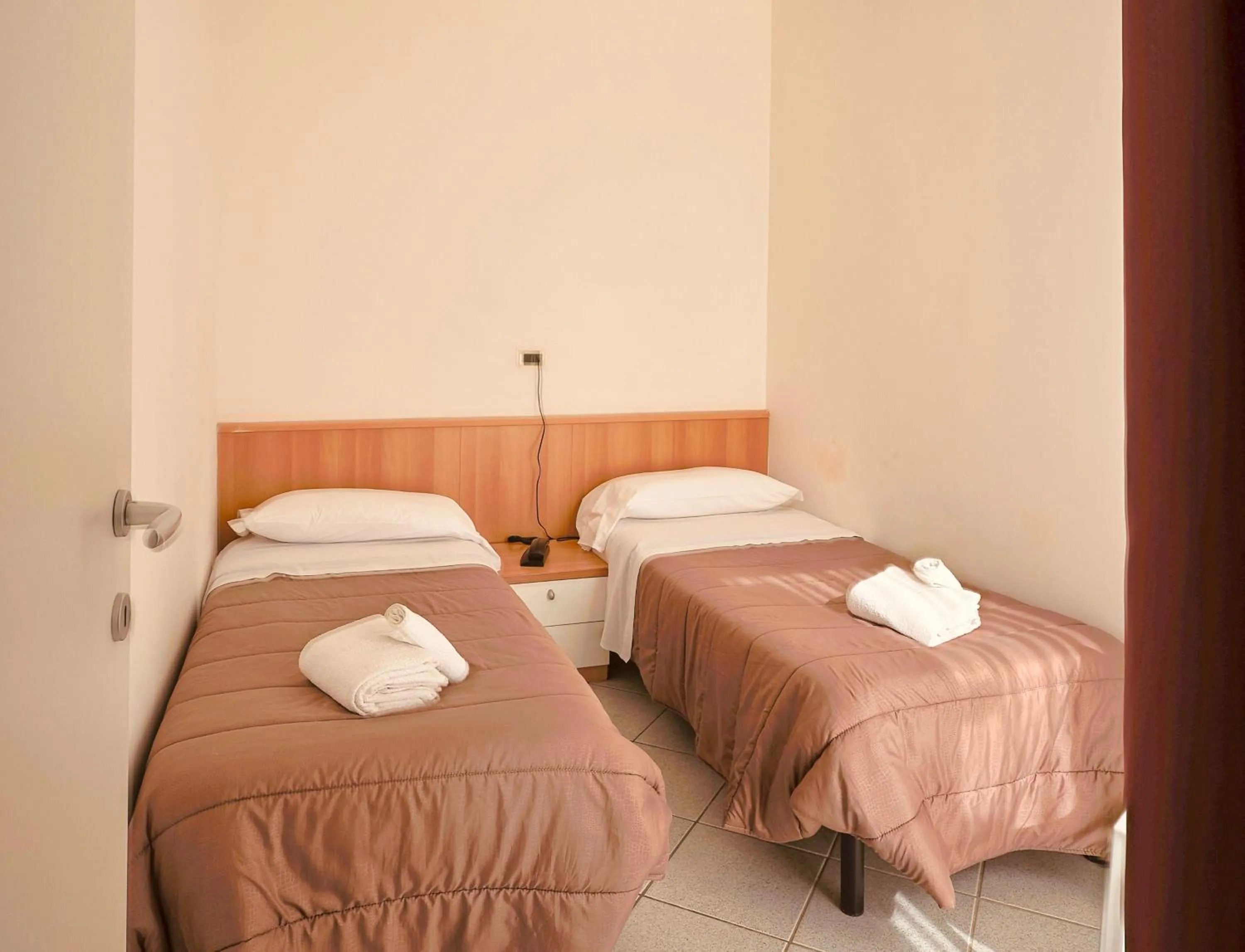 Bed in Hotel Felicioni