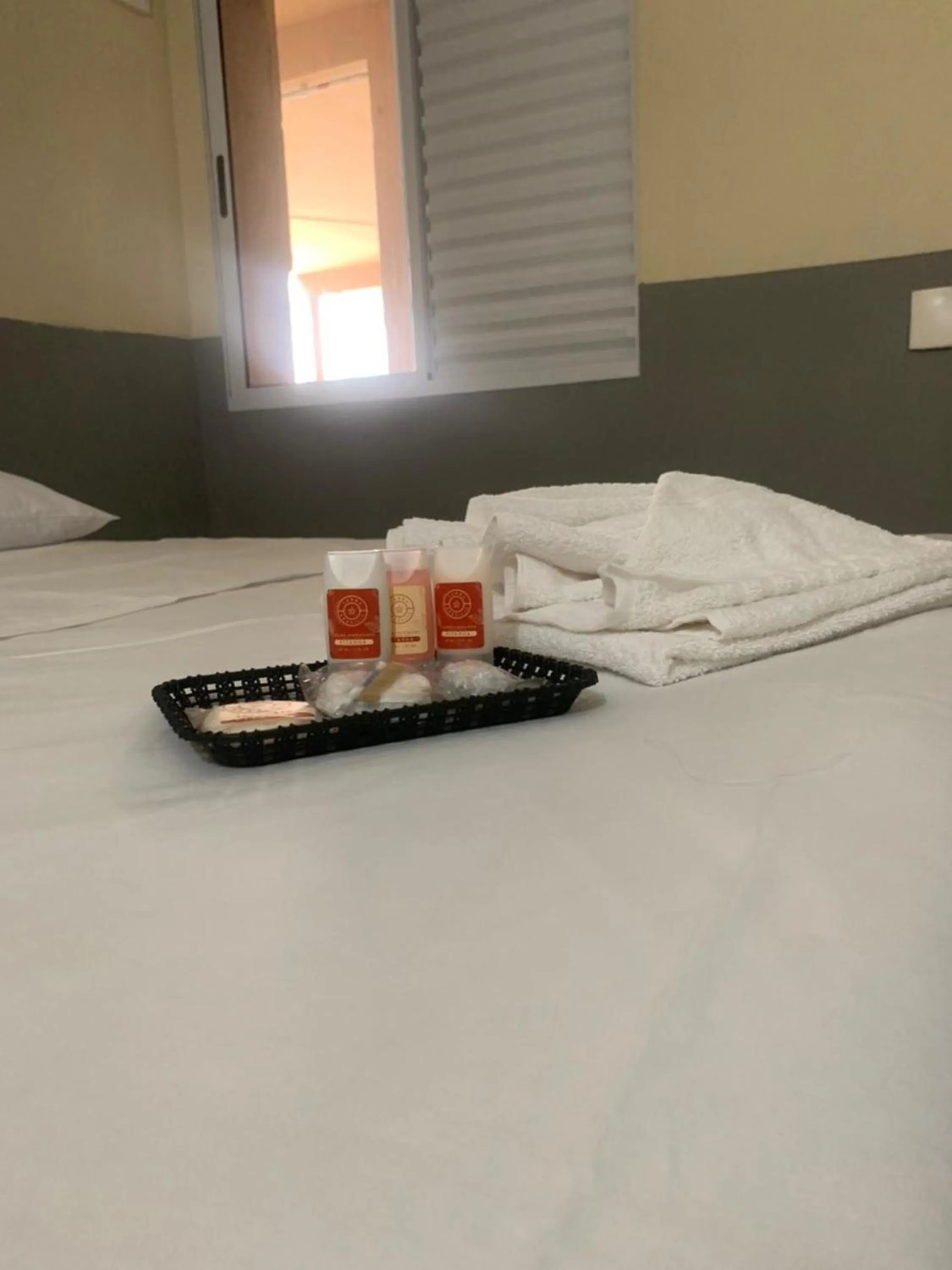 towels, Bed in Hotel Barão Ribeirão