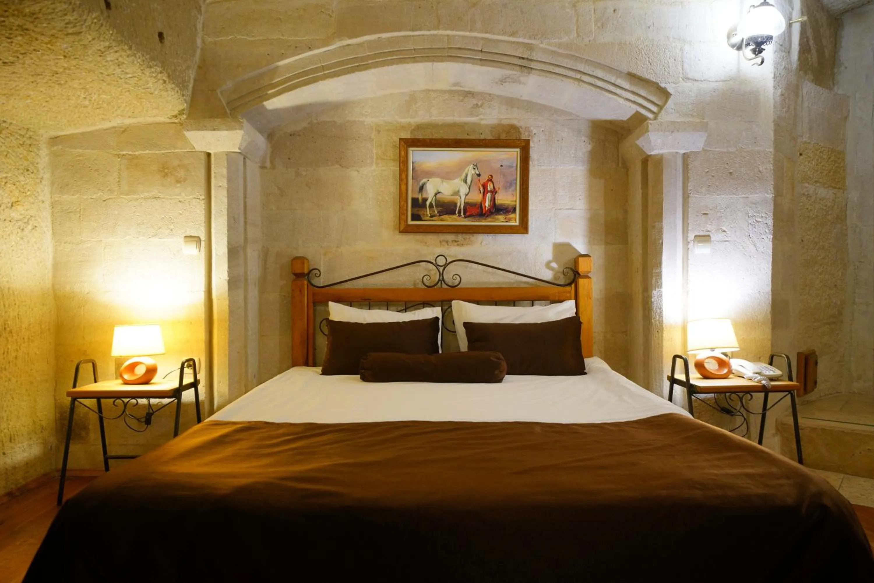 Bed in Harman Cave Hotel