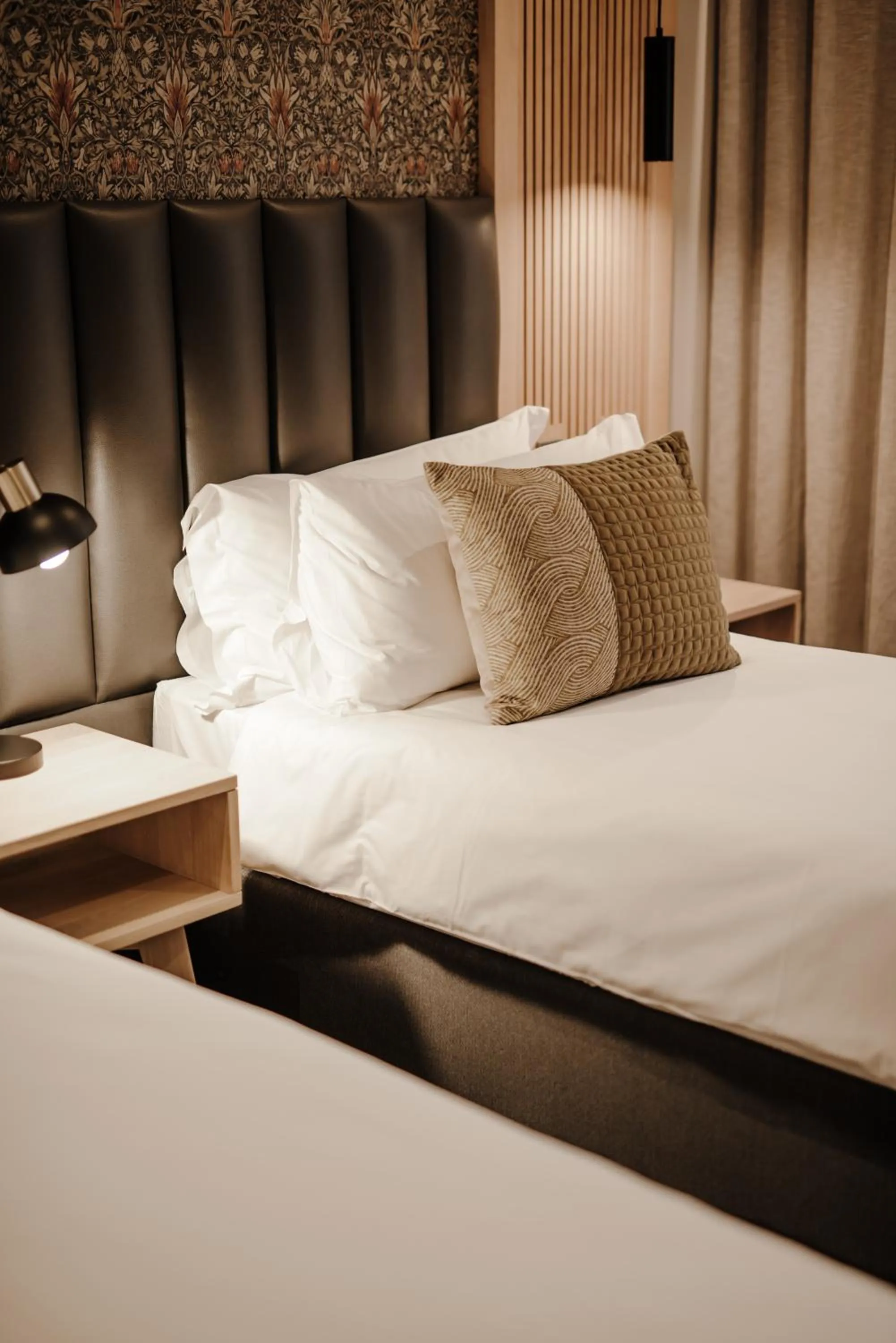 Bed in The Hawthorn Boutique Hotel