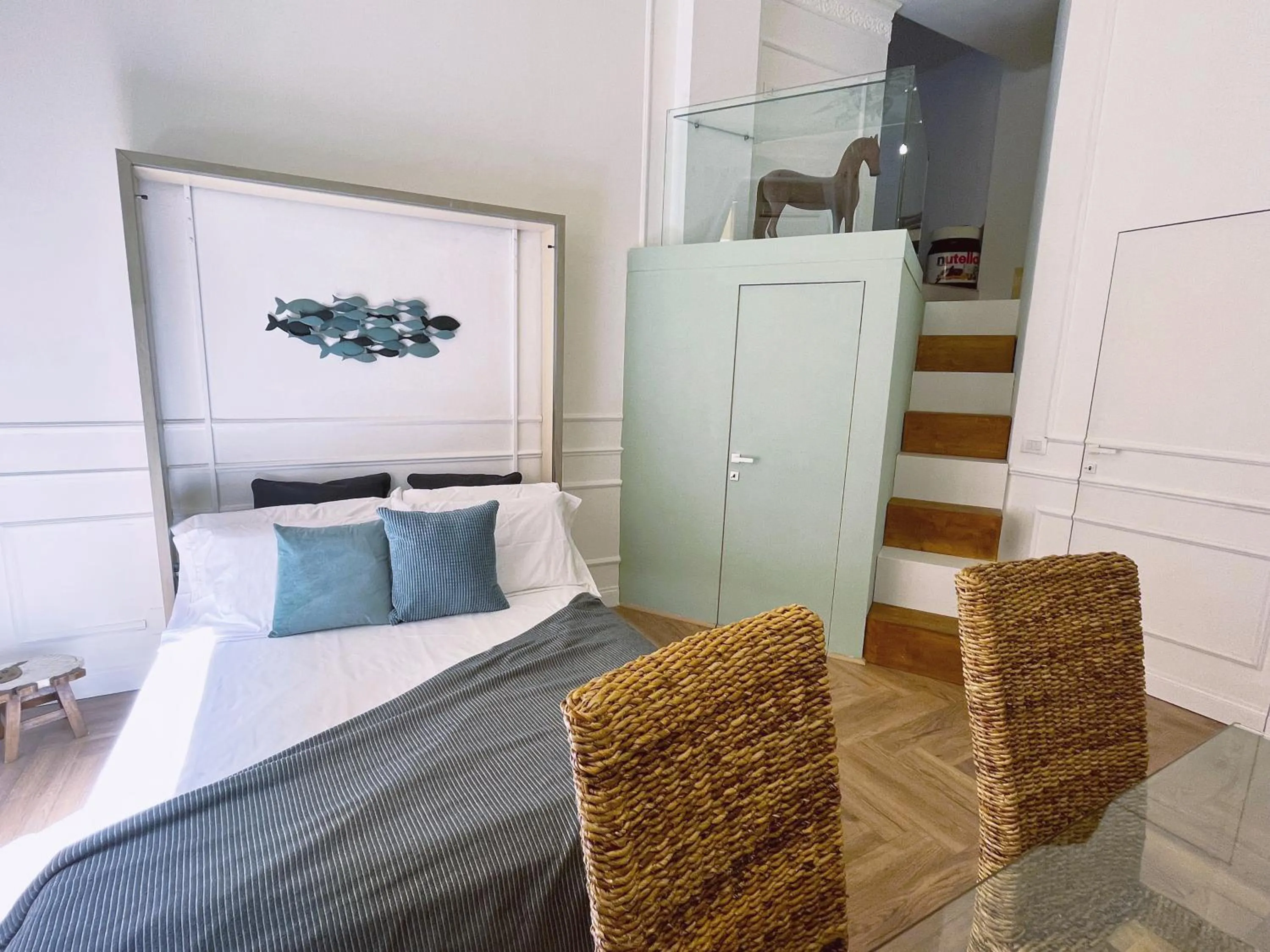 Bed in Happy Family Apartments Cairoli Studio