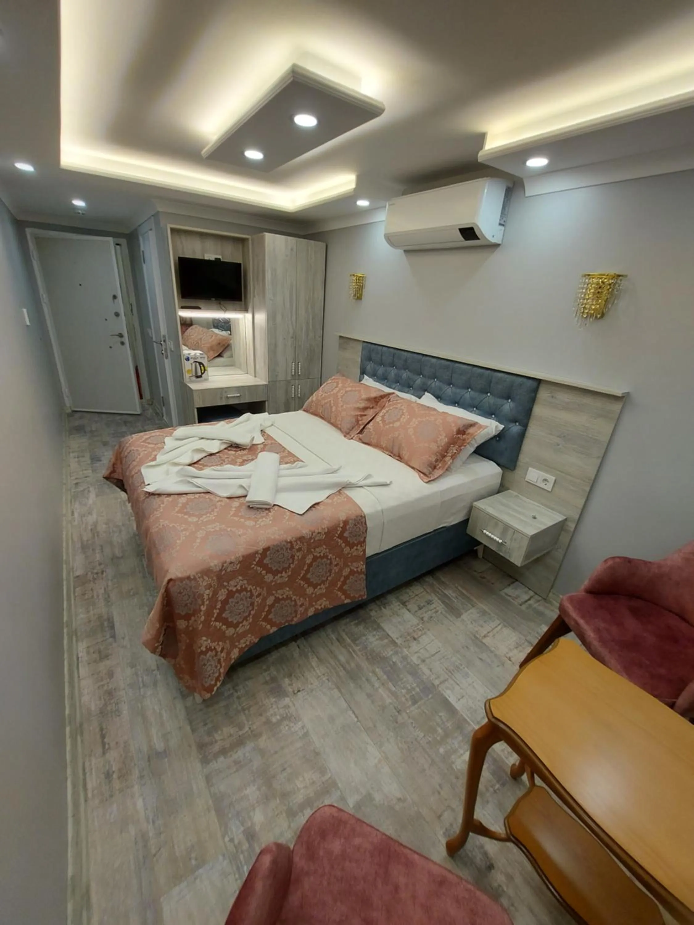 Bed in VERSECA HOTEL