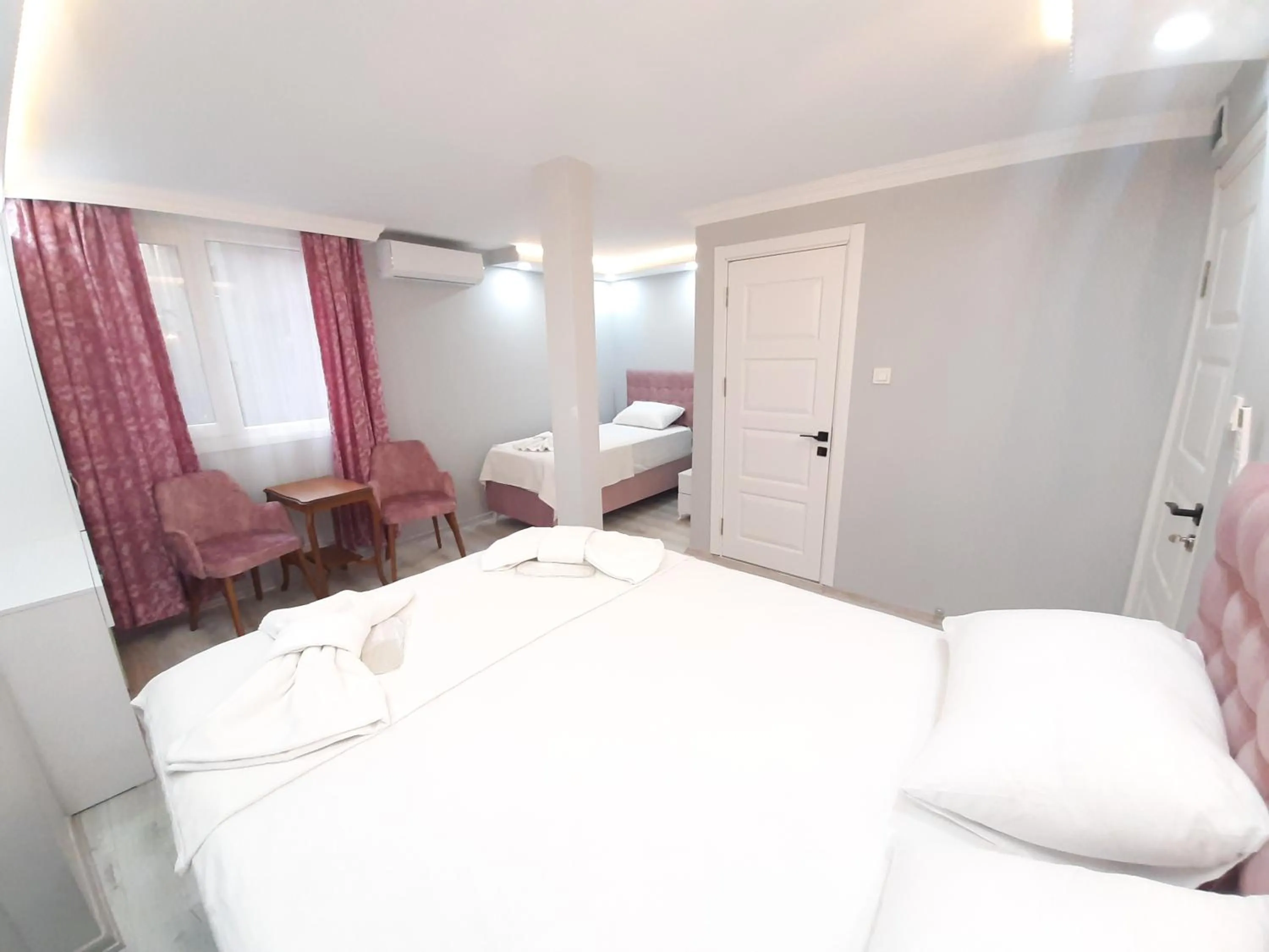 Bed in VERSECA HOTEL