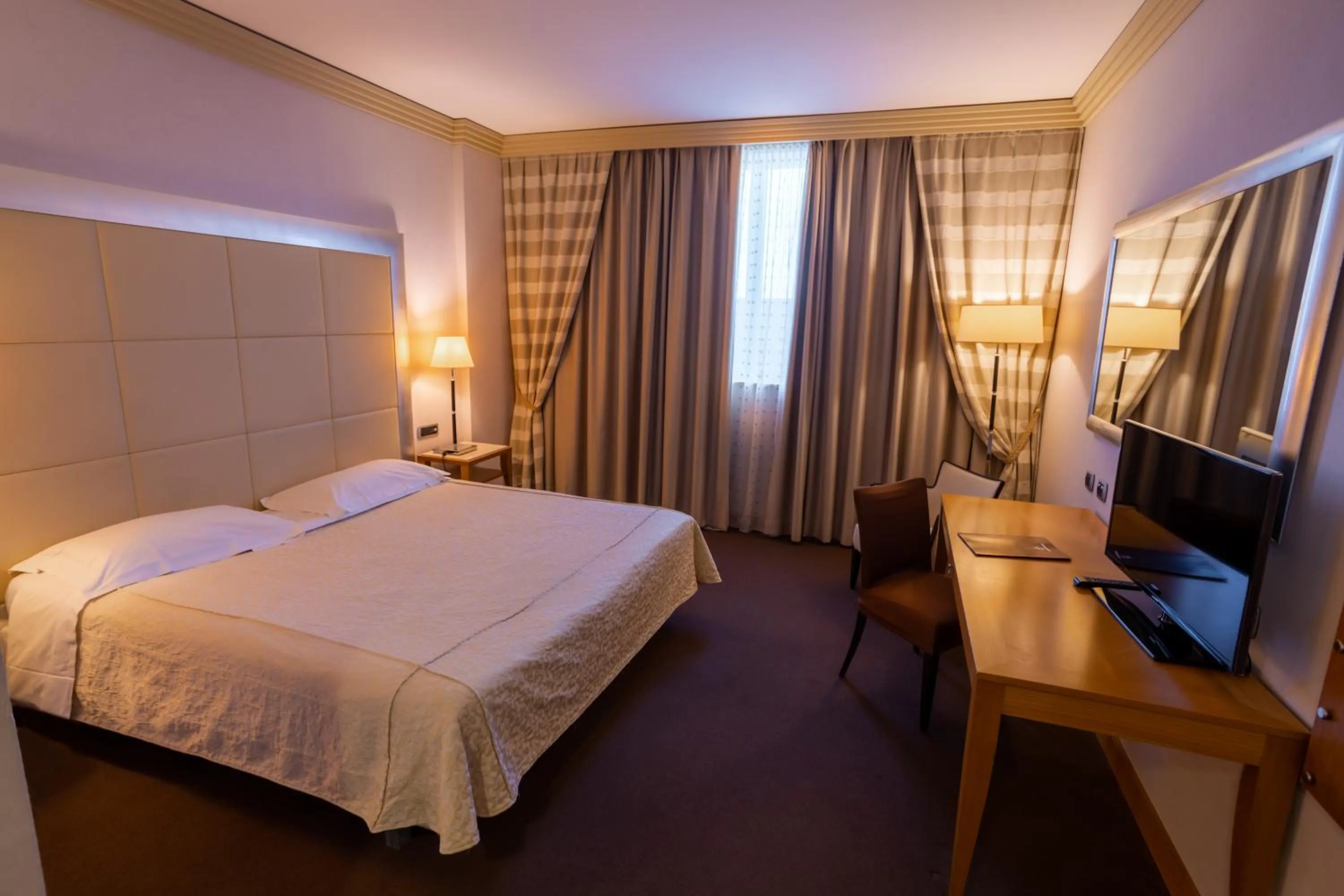 Bed in Papillo Hotels & Resorts Roma