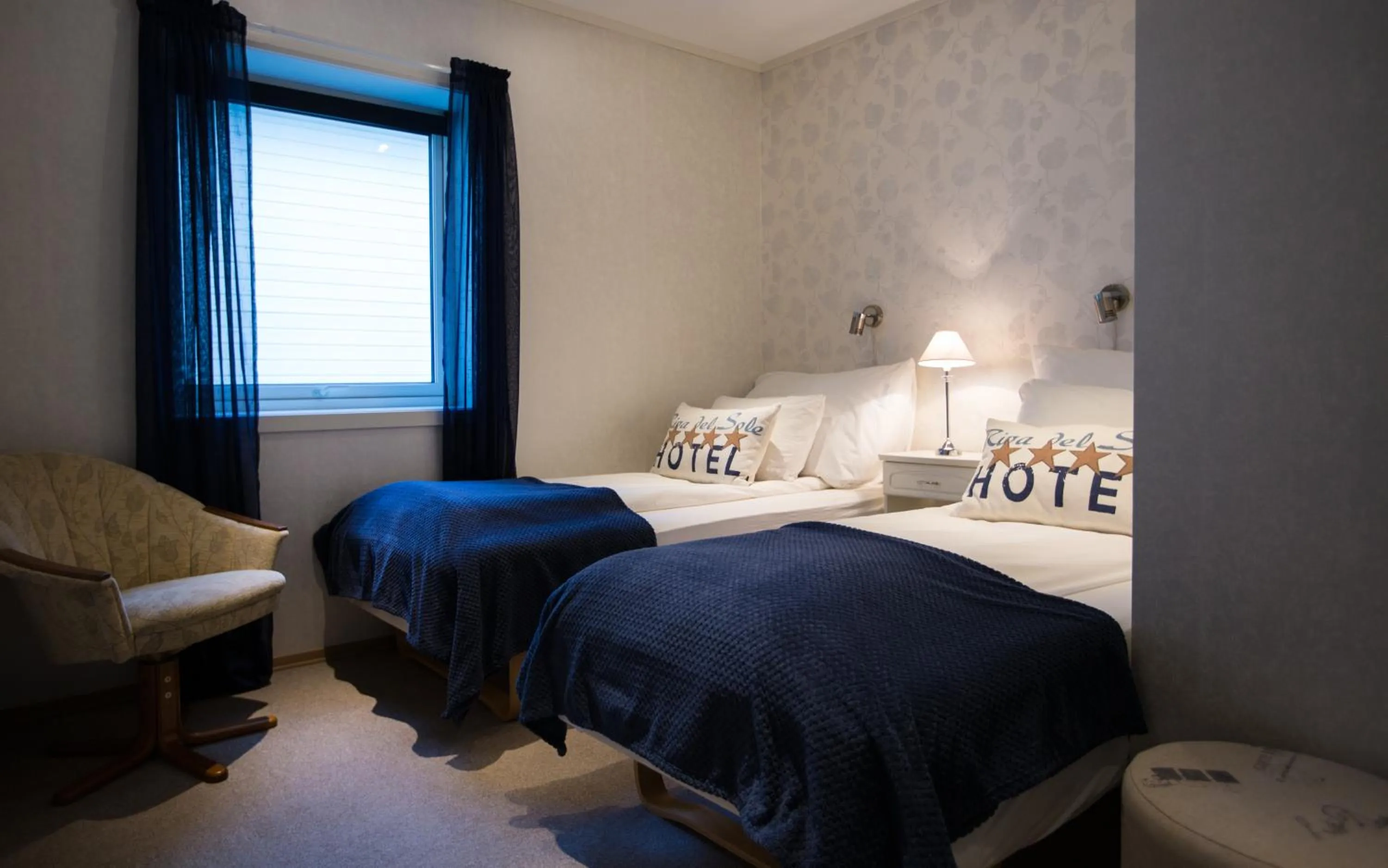 Bed in Arctic Panorama Lodge