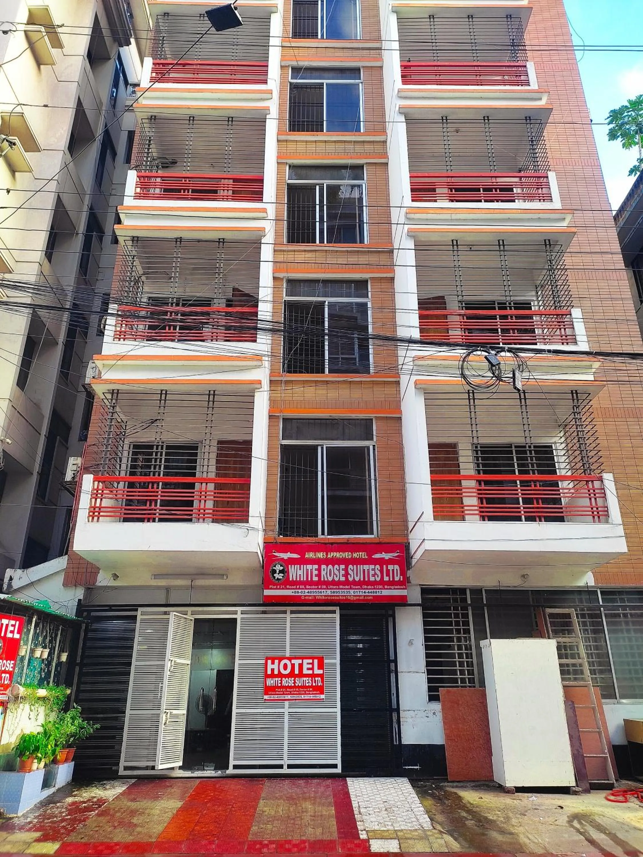 Property building in White Rose Suites Ltd