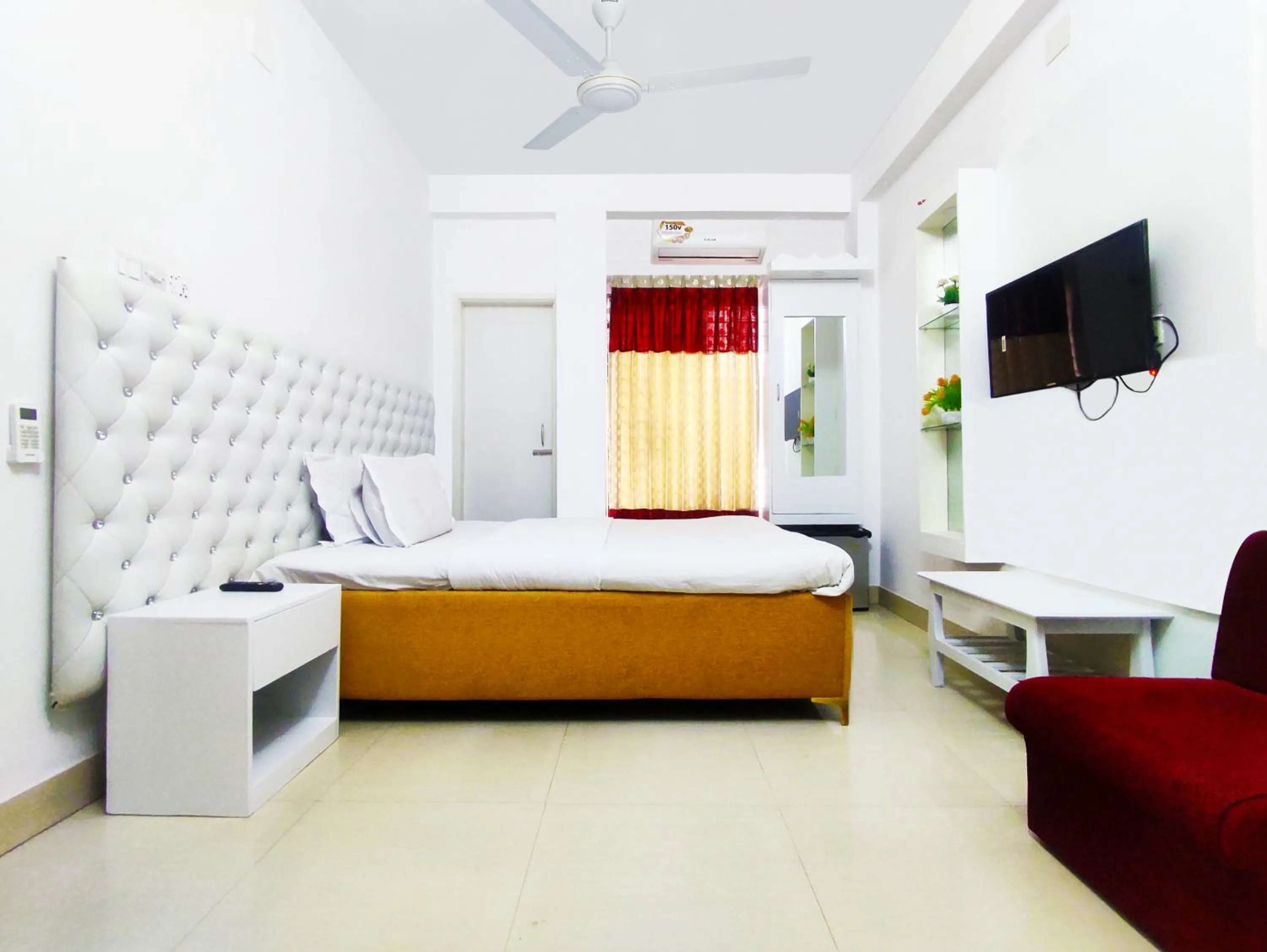 Bed in White Rose Suites Ltd