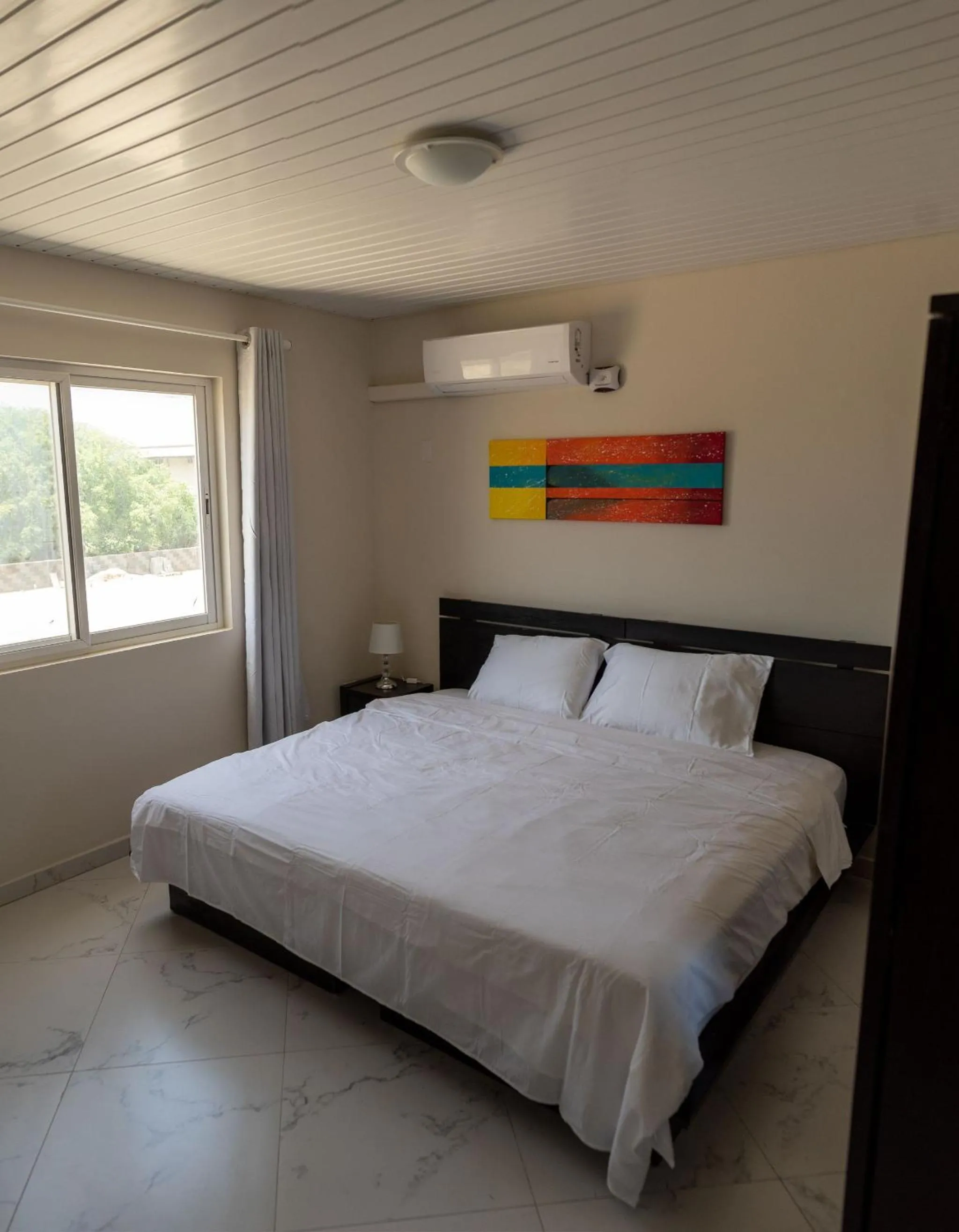 Bedroom, Bed in Elegant 2-bedroom apartment 2 km from Eagle beach