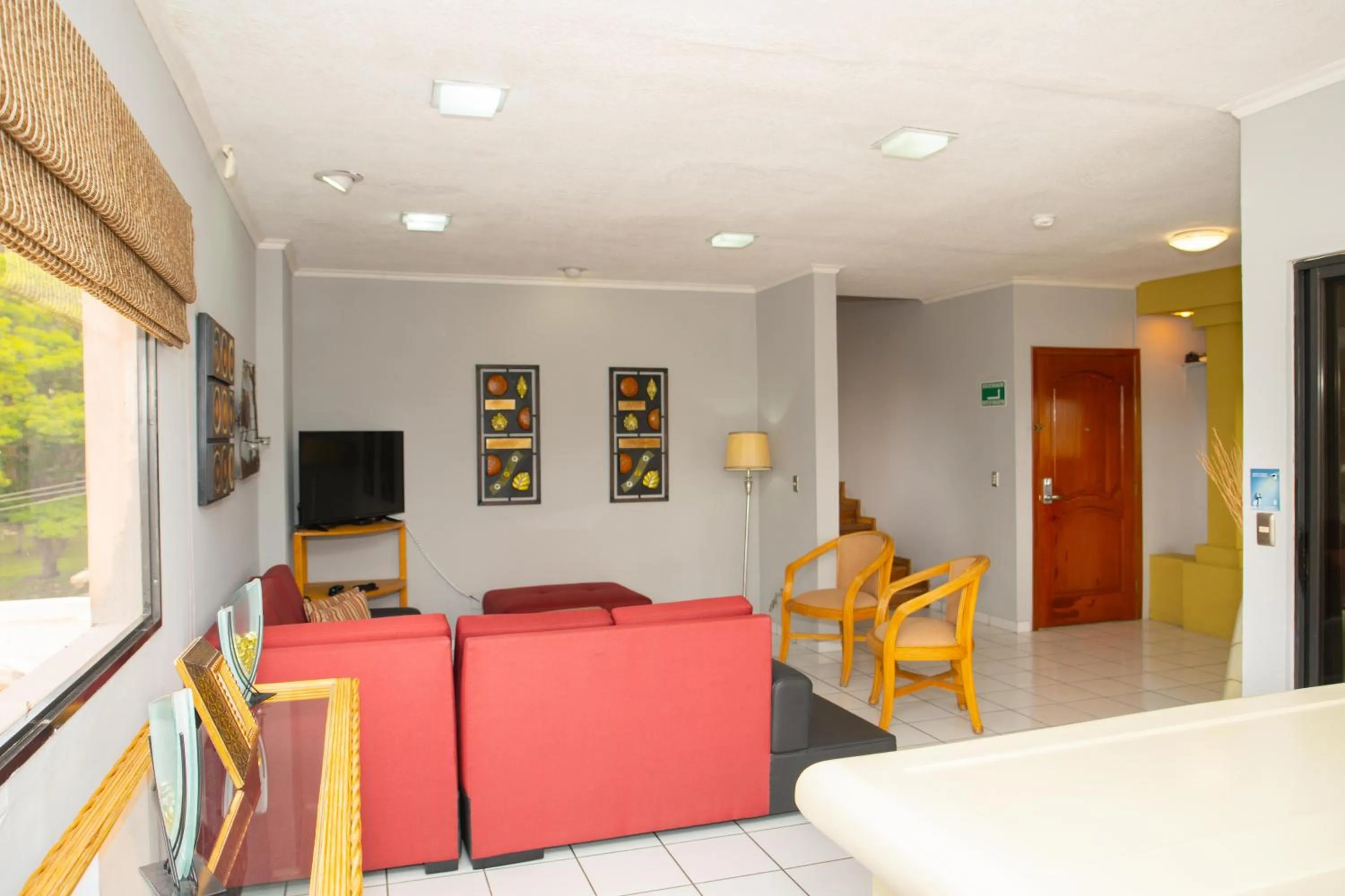 Living room in Aparthotel Guijarros