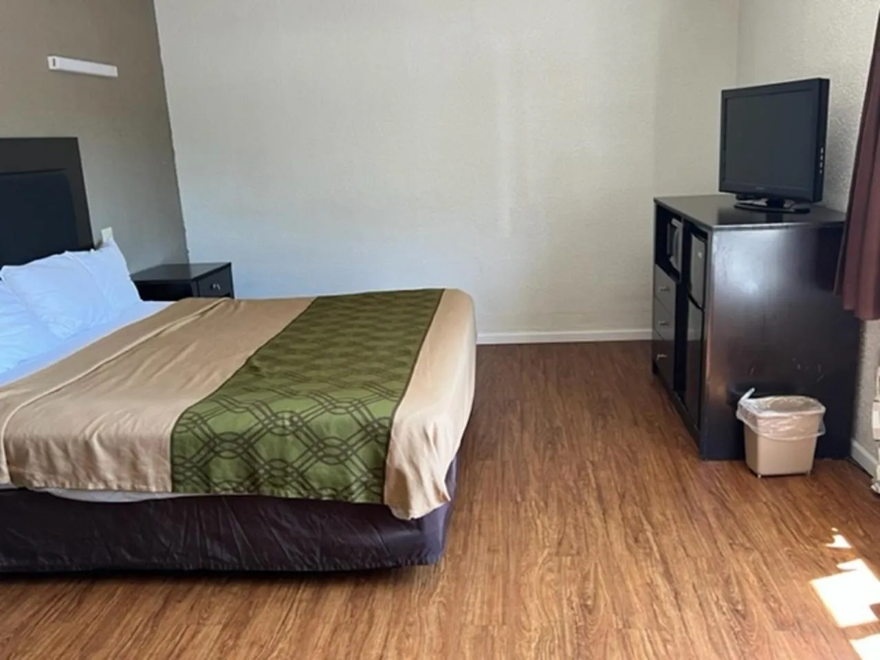 Bed in Posh Inn & Suites