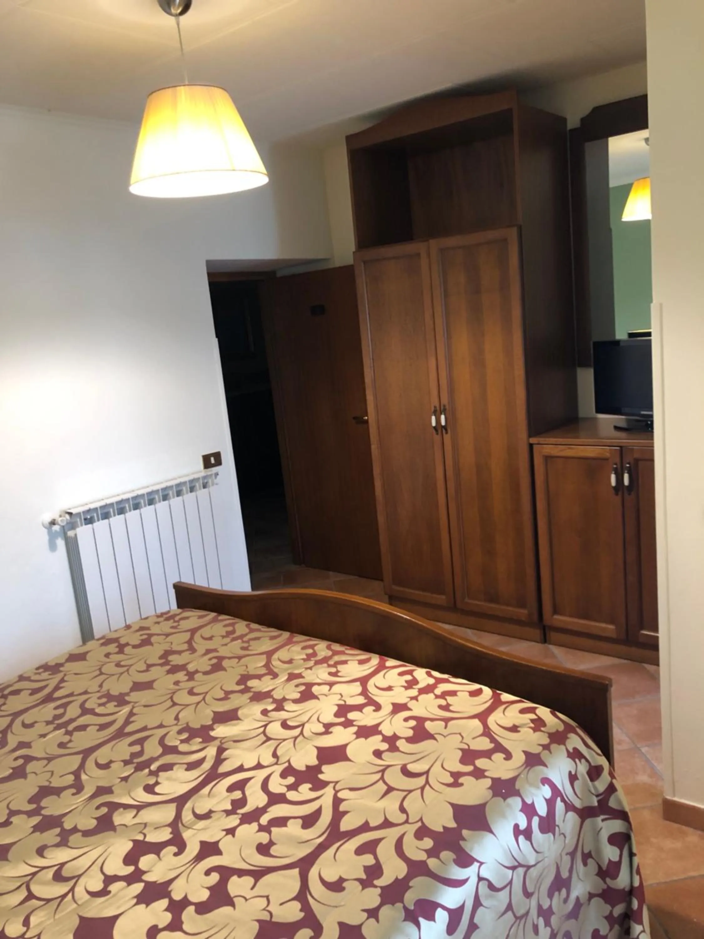 Bed in Albergo Miramonti