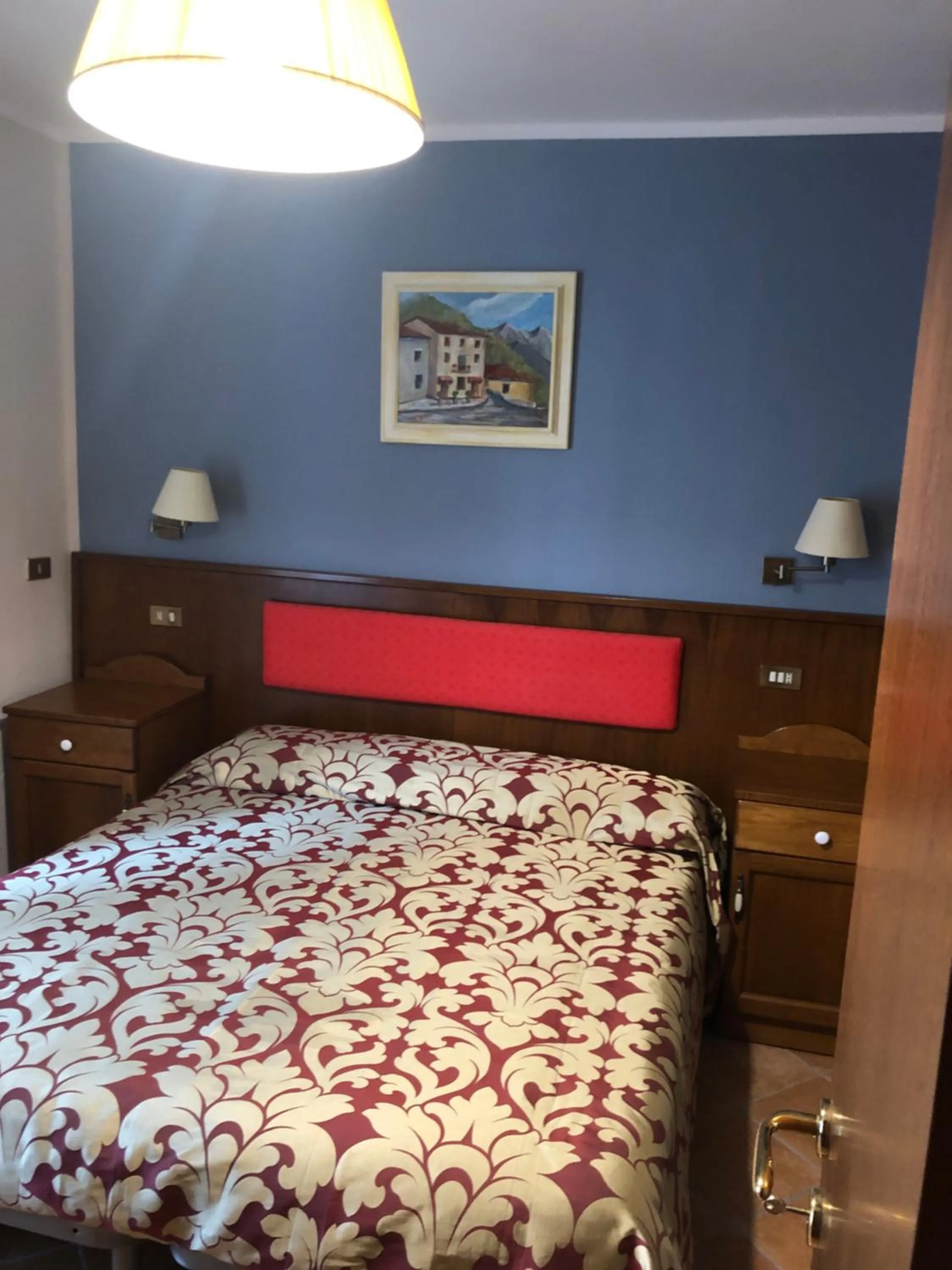 Bed in Albergo Miramonti