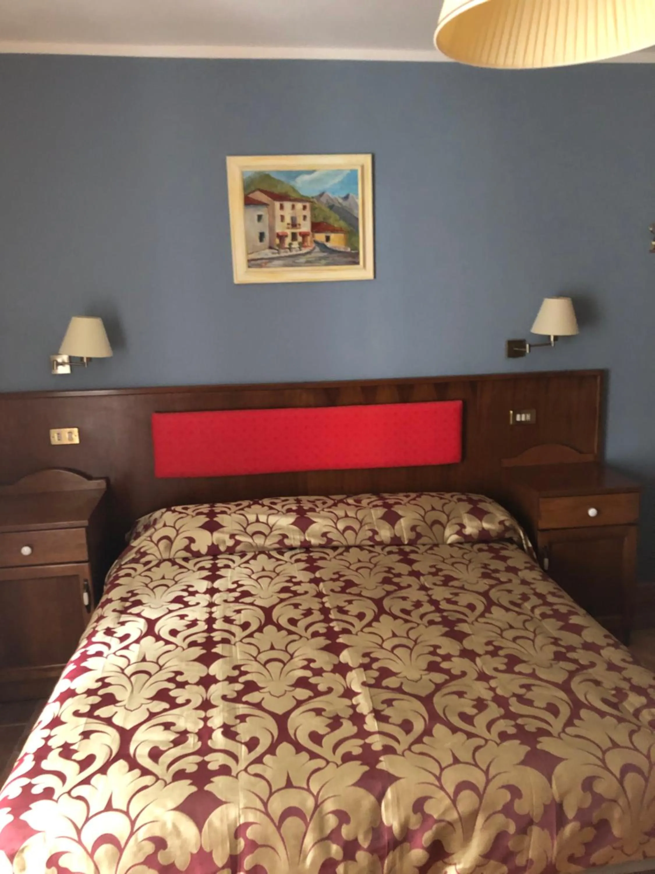 Bed in Albergo Miramonti