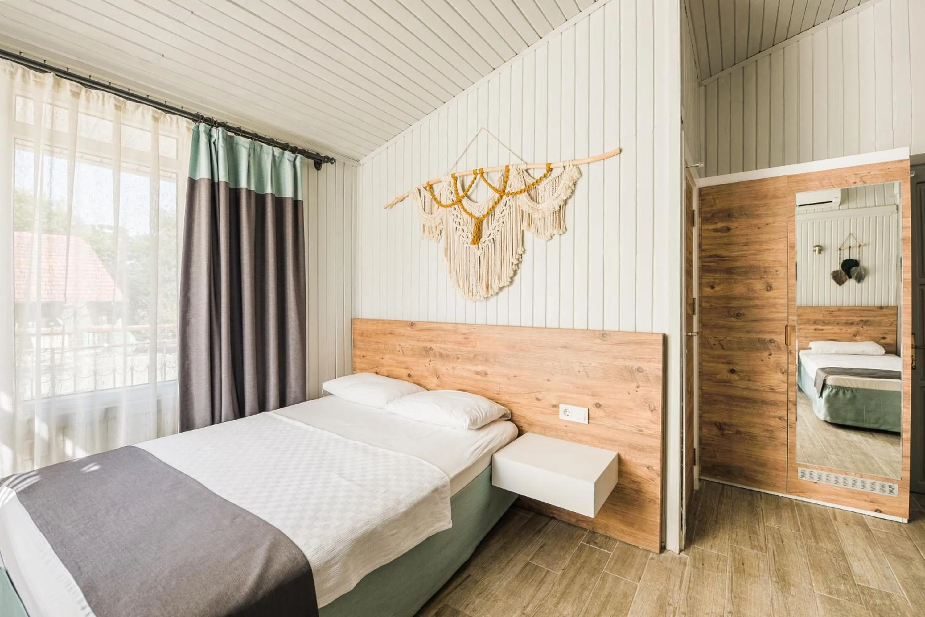 Bed in Leda Beach Hotel