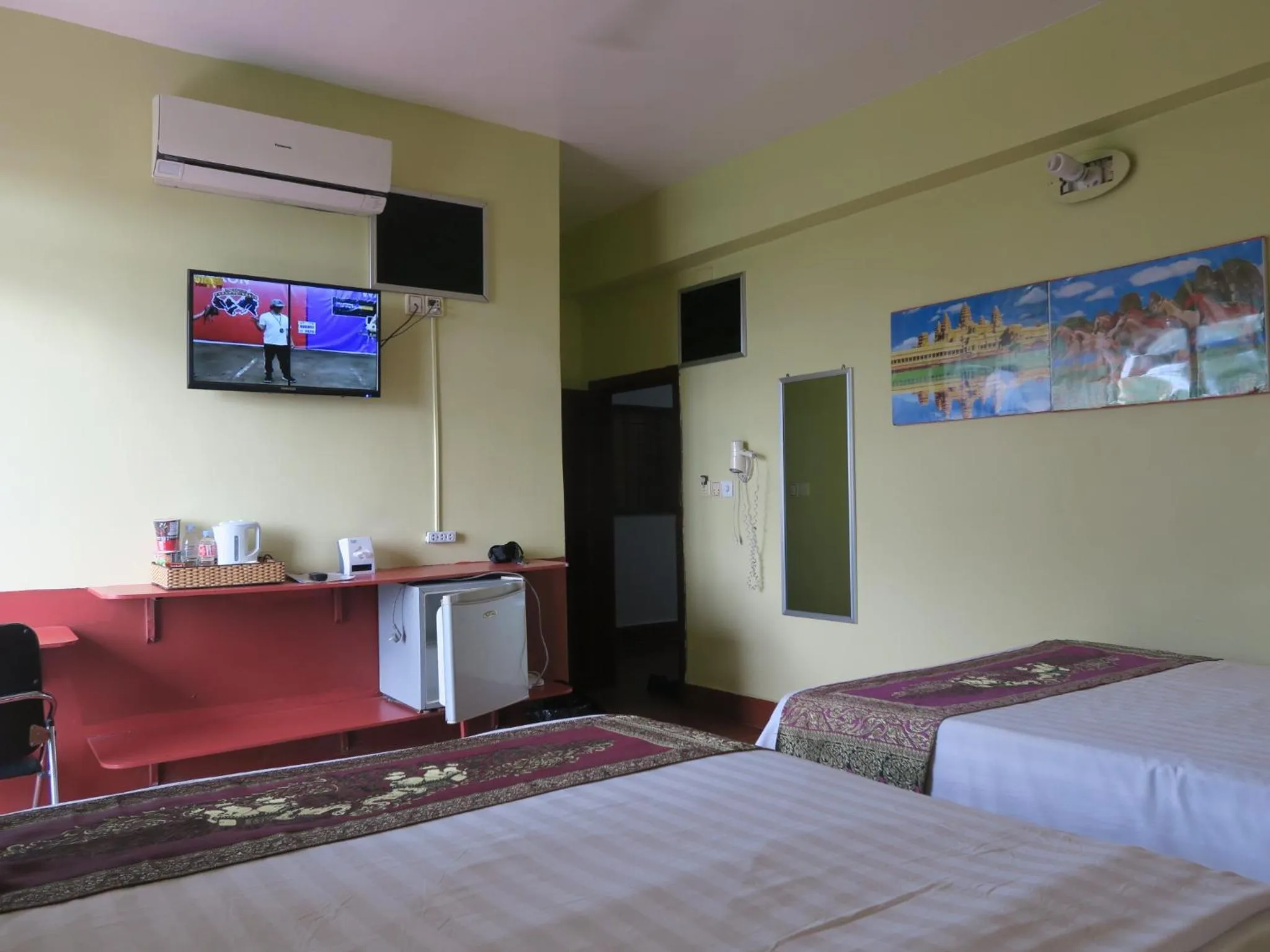 Bed in River Dolphin Hotel