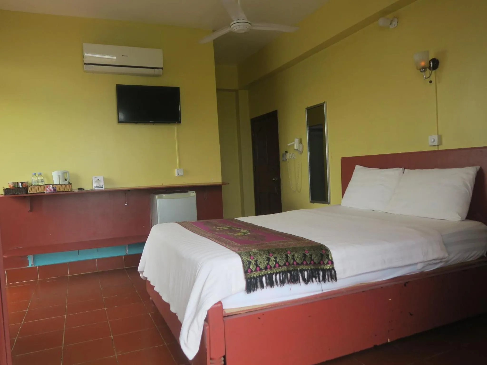 Bed in River Dolphin Hotel