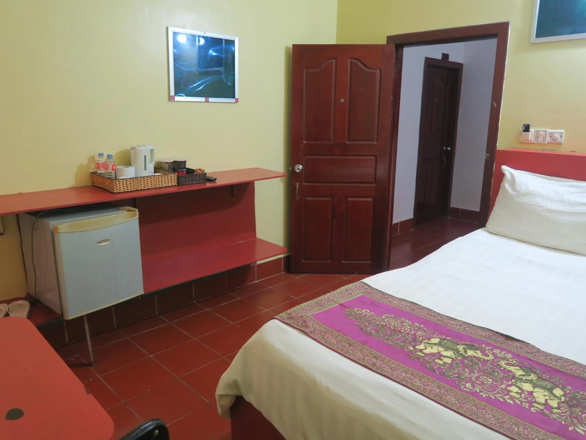 Bed in River Dolphin Hotel