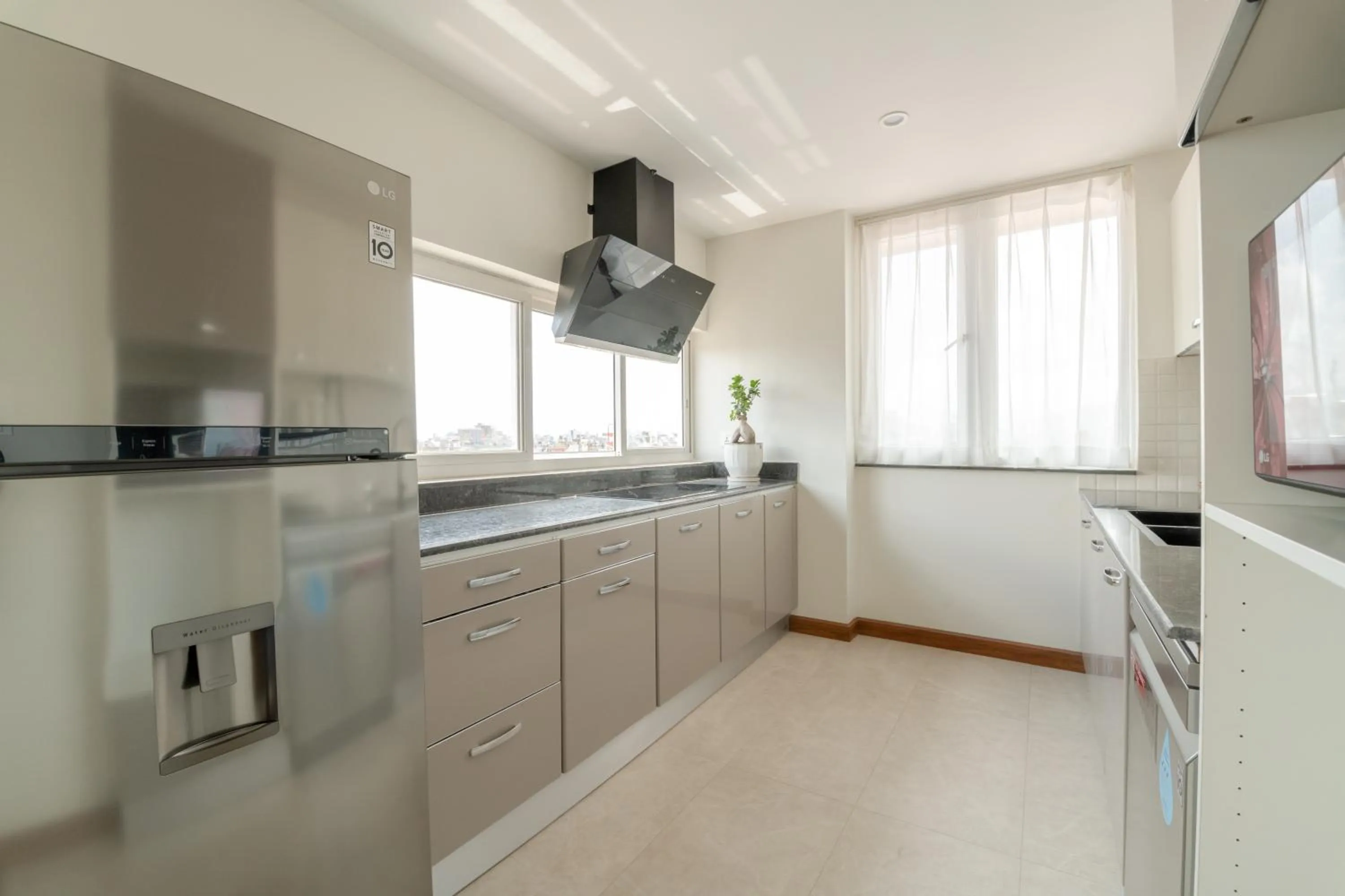 Kitchen or kitchenette in Mila Hotel