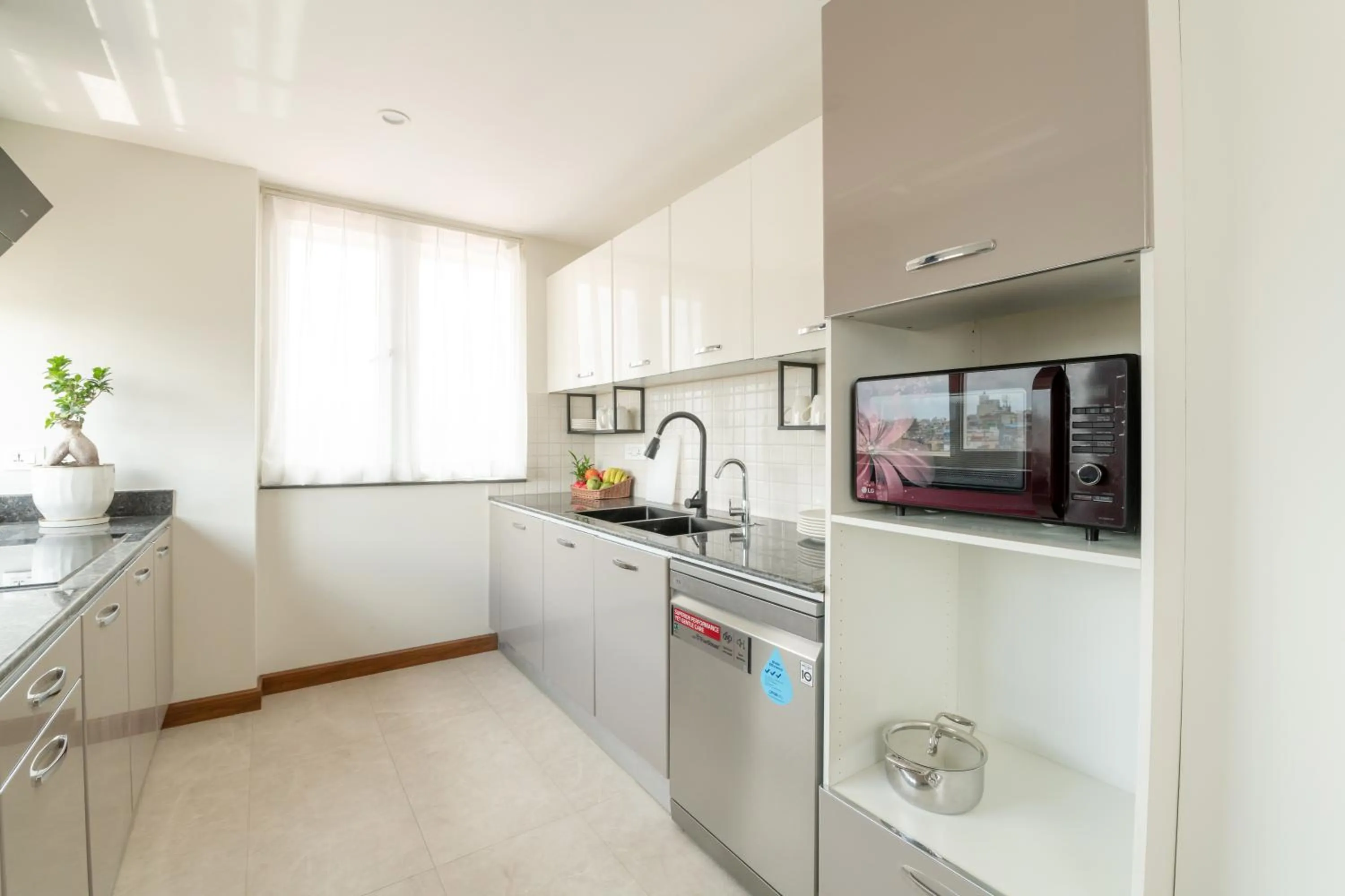 Kitchen or kitchenette in Mila Hotel