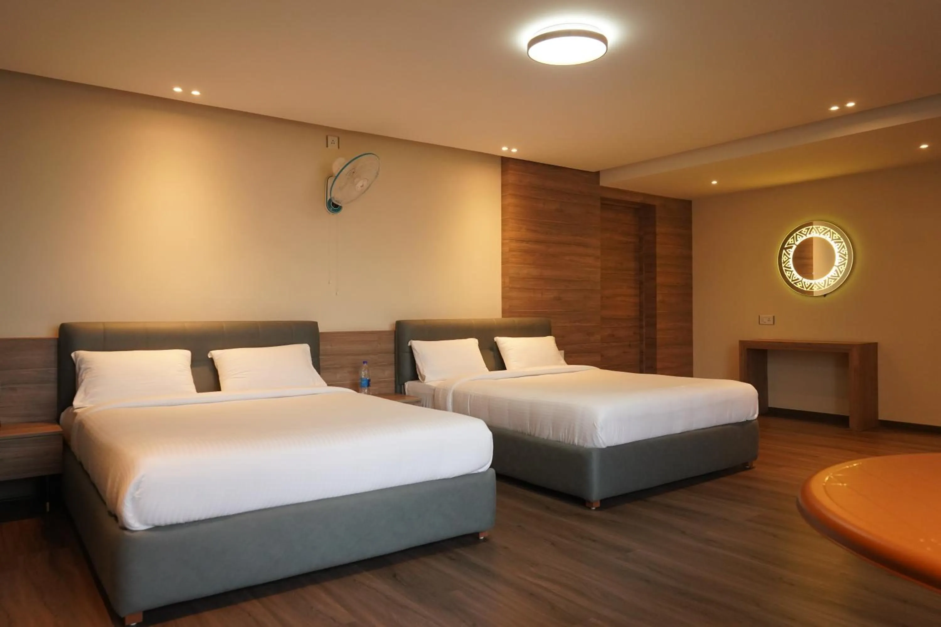 Bed in Hotel Bekal International
