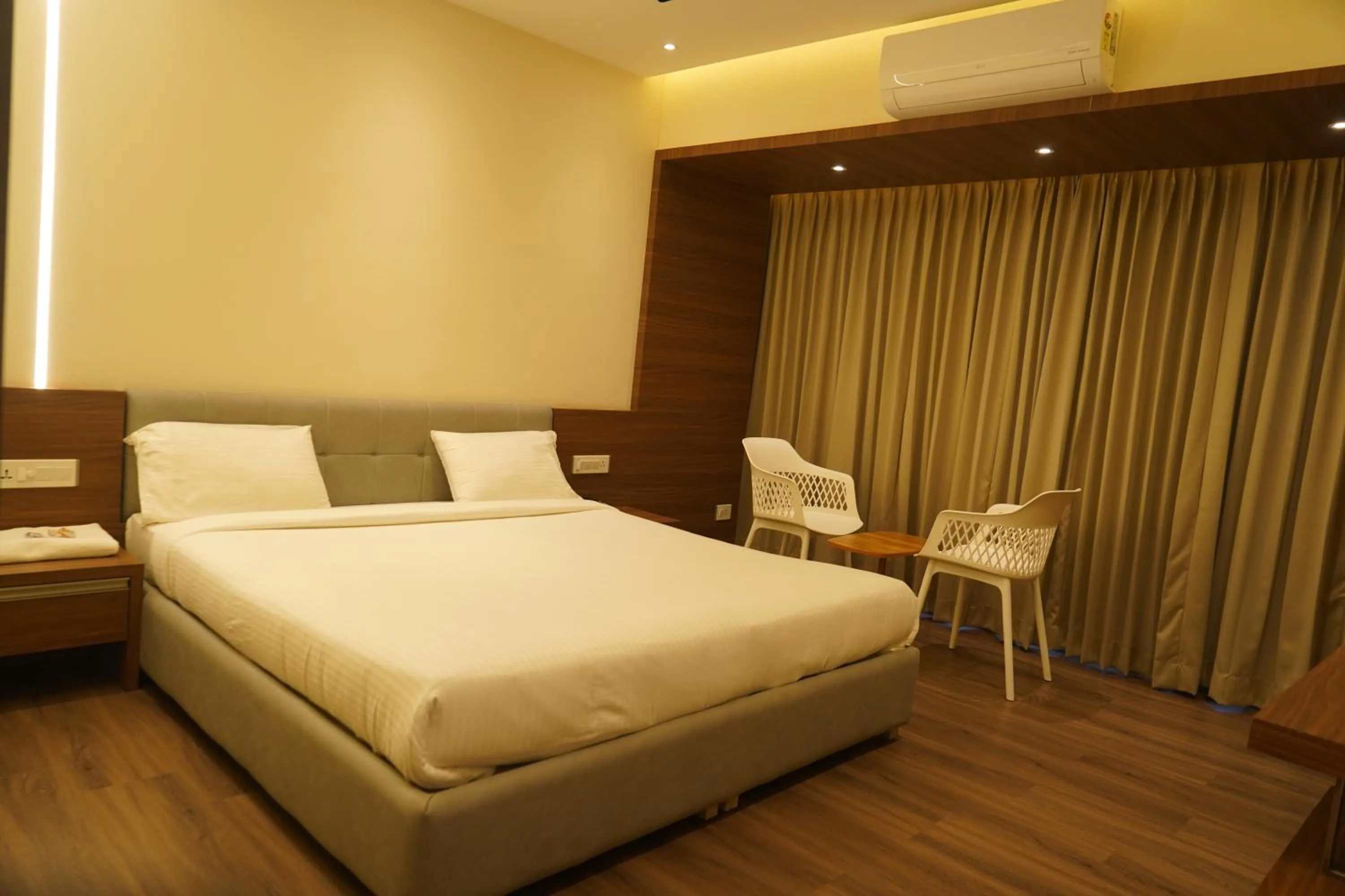Bed in Hotel Bekal International