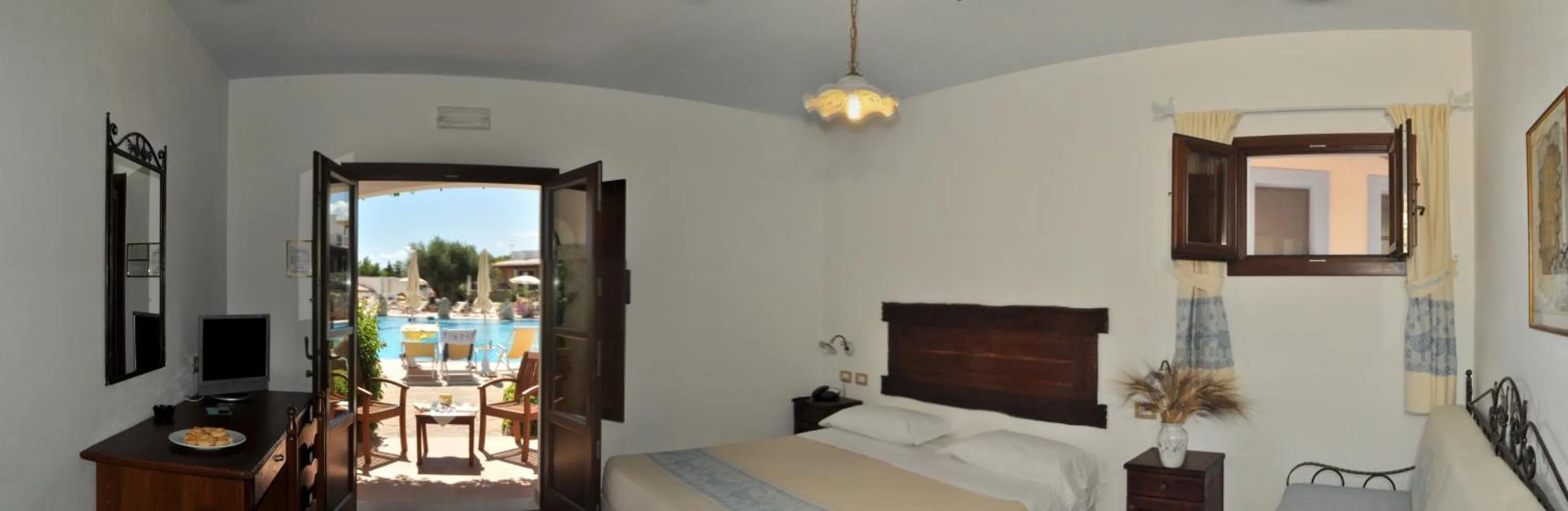 Bedroom in Hotel Resort Nuraghe Arvu