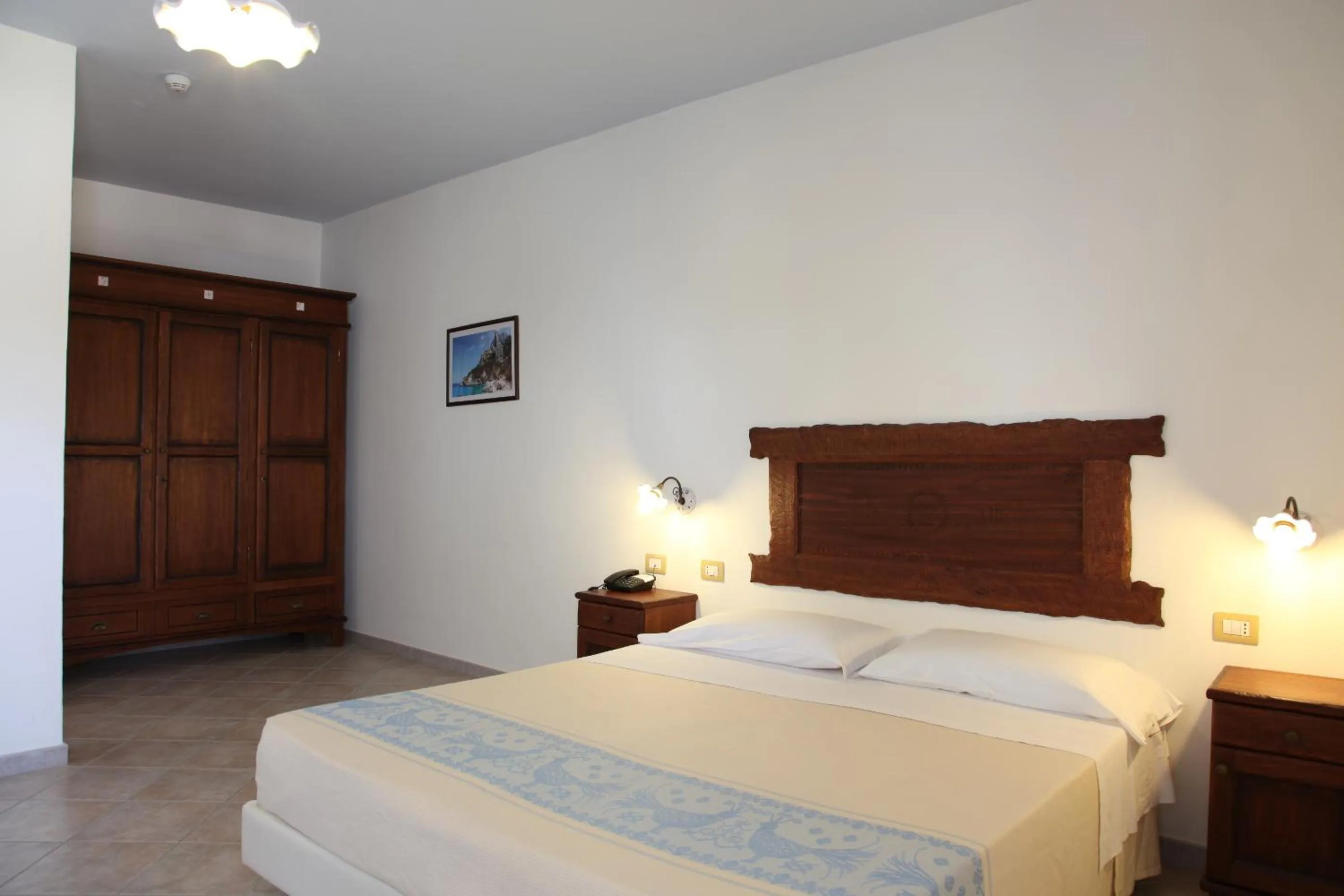 Bed in Hotel Resort Nuraghe Arvu