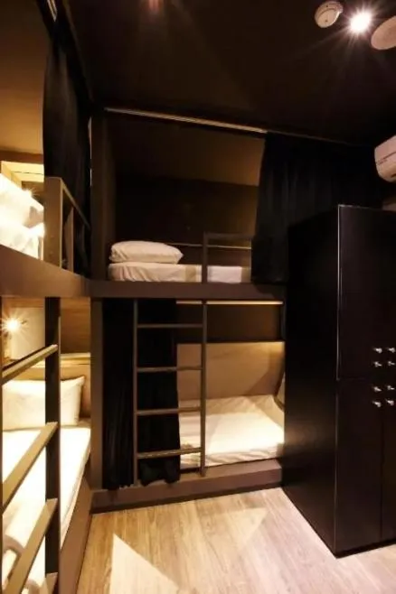 Bed in Main Inn Taipei