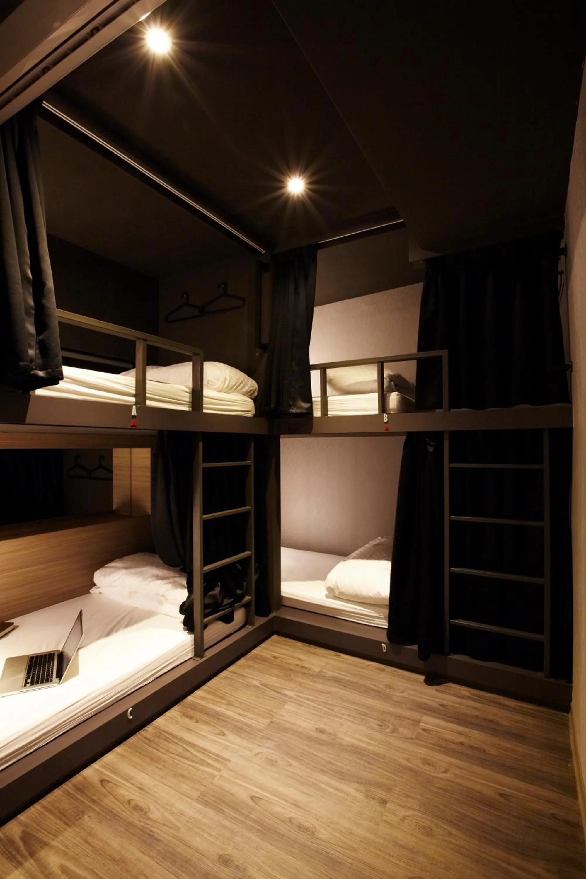 Bed in Main Inn Taipei