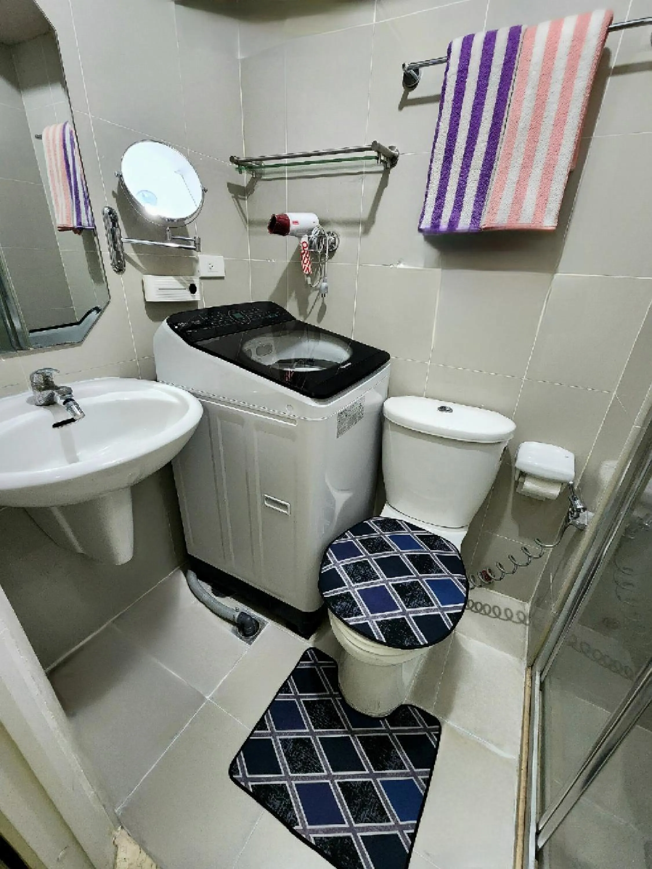 Shower in Elegant Studio at Grass Residences 1-5 persons only, Quezon City