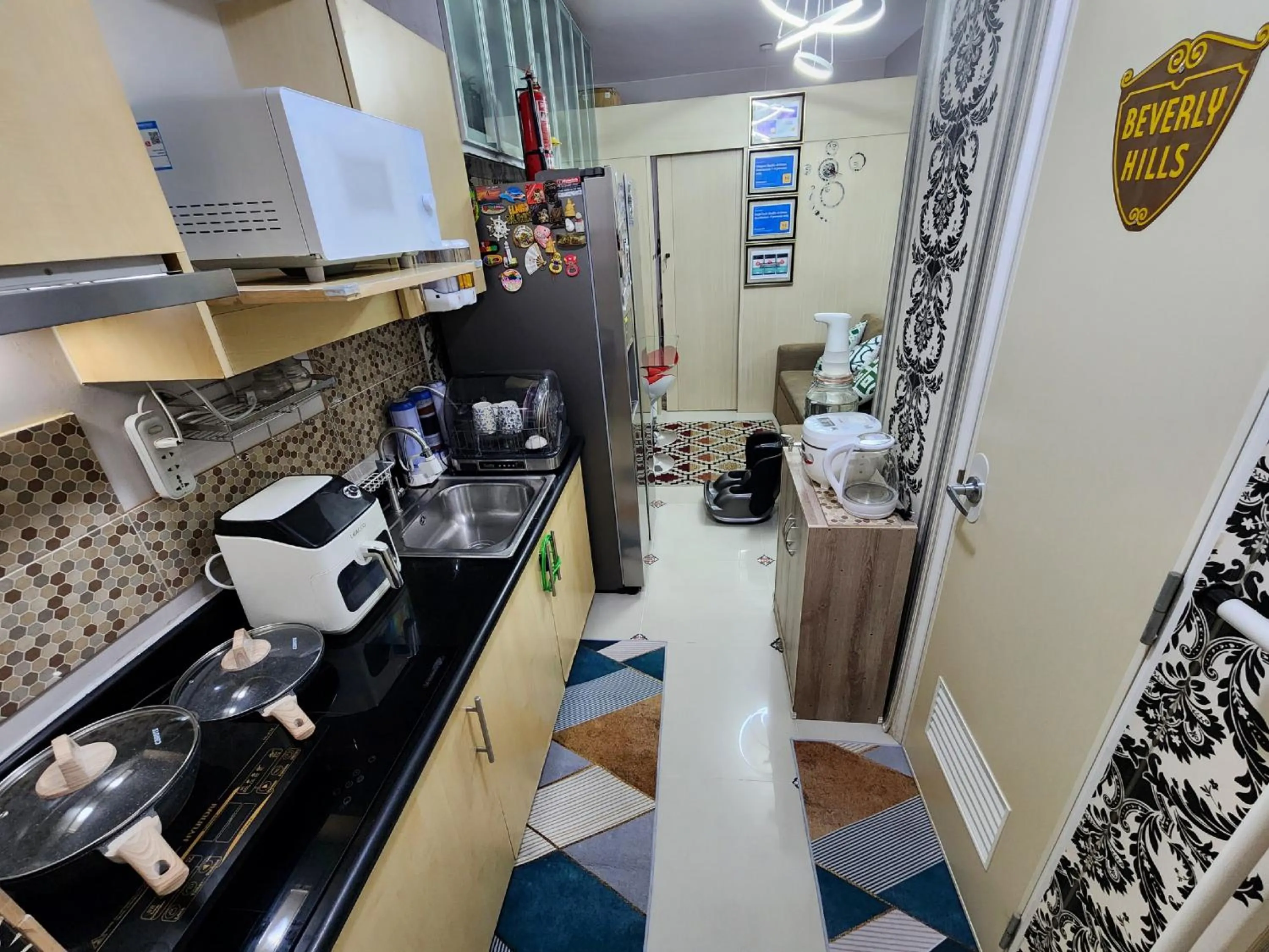 Kitchen or kitchenette in Elegant Studio at Grass Residences 1-5 persons only, Quezon City