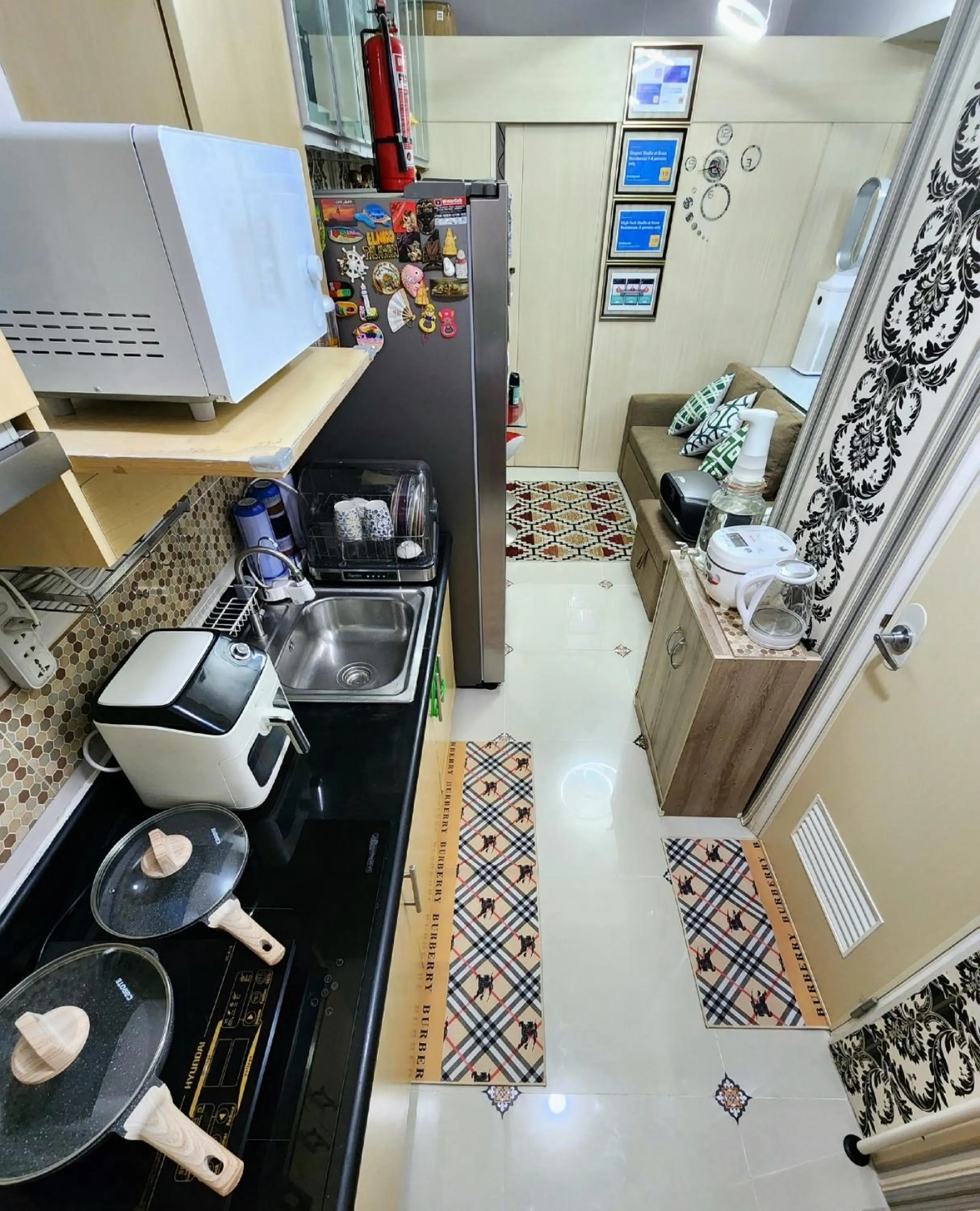 Kitchen or kitchenette in Elegant Studio at Grass Residences 1-5 persons only, Quezon City