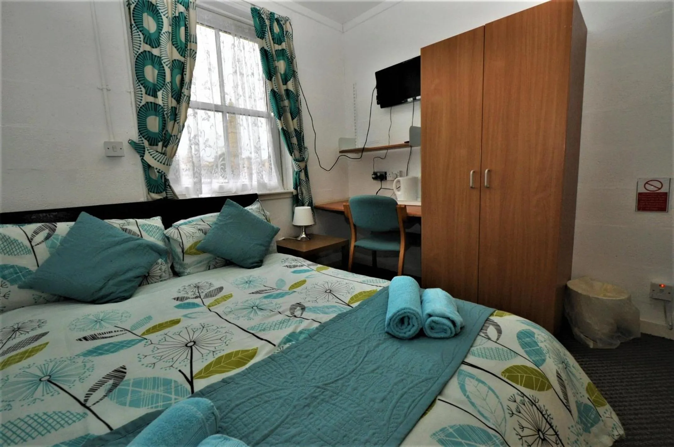 Photo of the whole room, Bed in The Waterfront